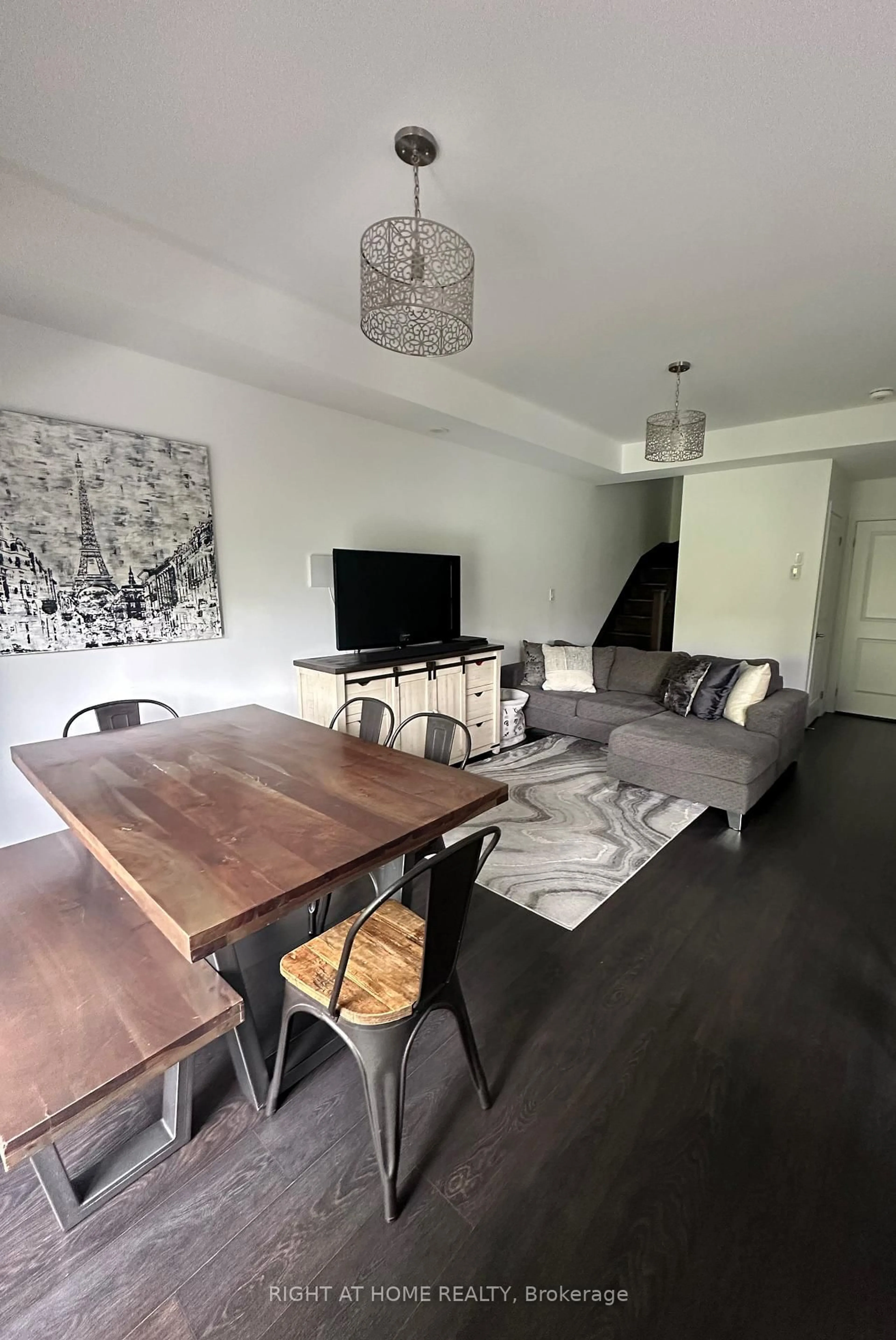 Living room with furniture, wood/laminate floor for 201 Pine Grove Rd #423, Vaughan Ontario L4L 0H8