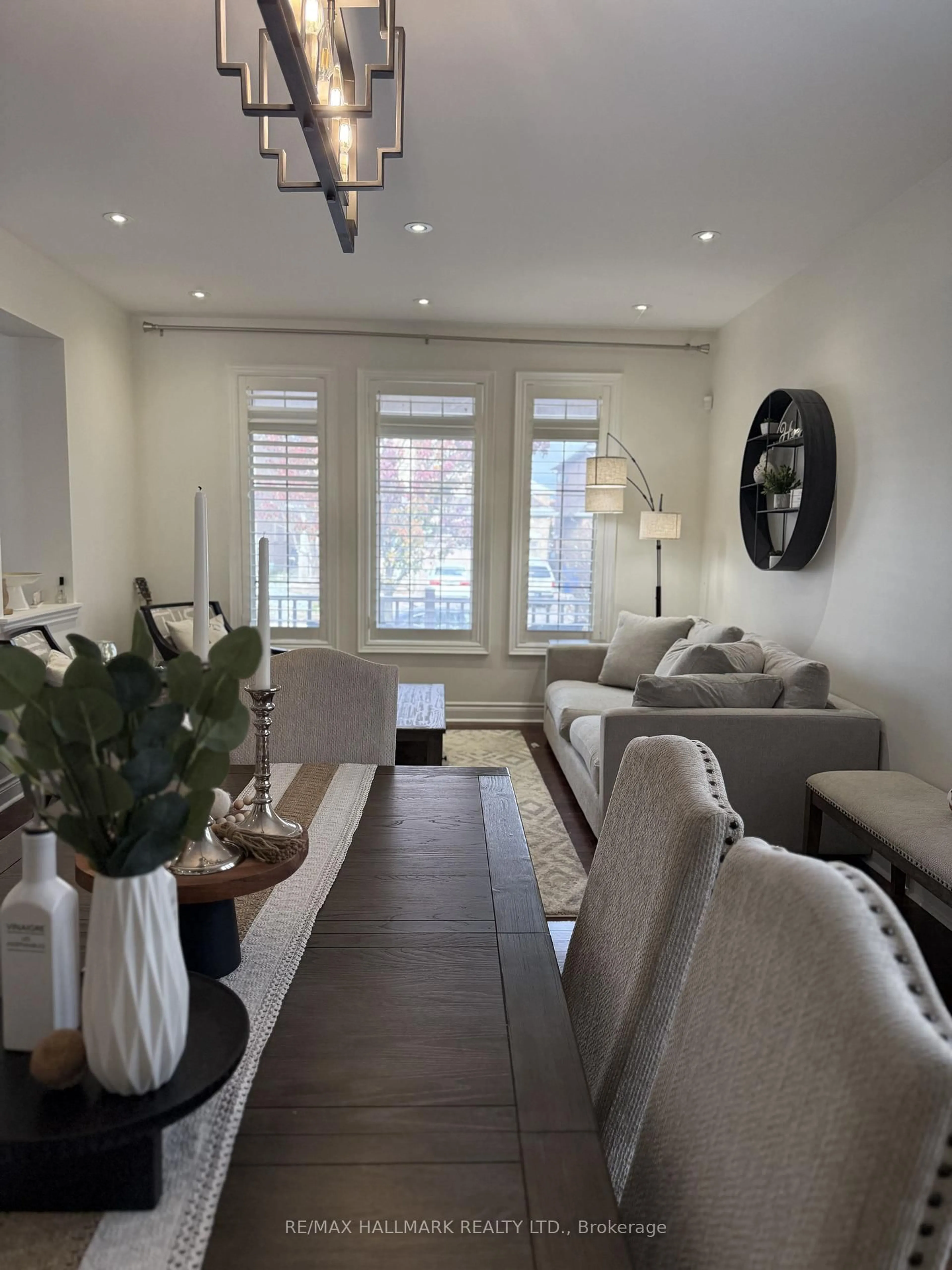 Living room with furniture, wood/laminate floor for 220 Tonner Cres, Aurora Ontario L4G 7T7