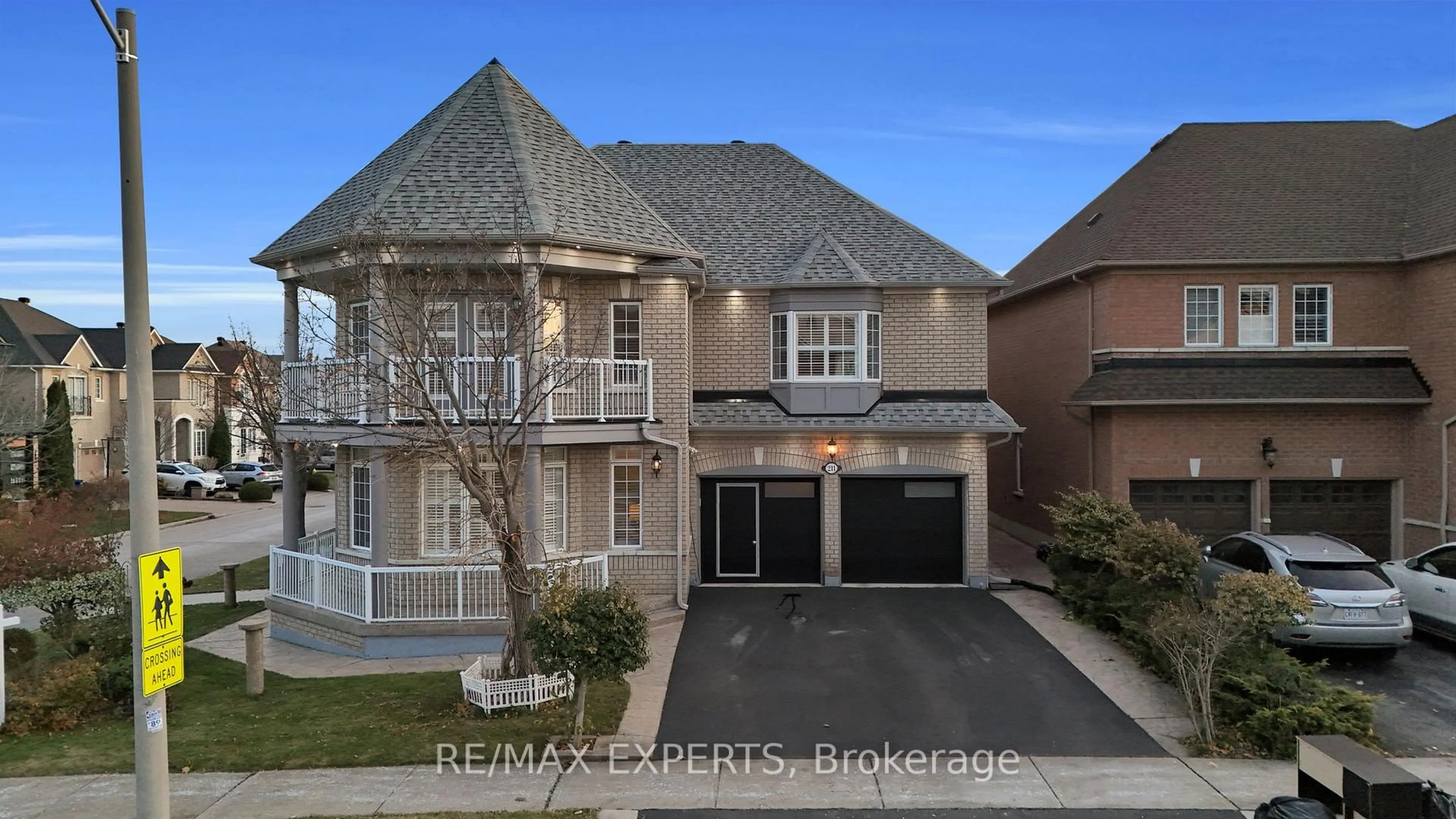 Home with brick exterior material, street for 211 Davos Rd, Vaughan Ontario L4H 2X1