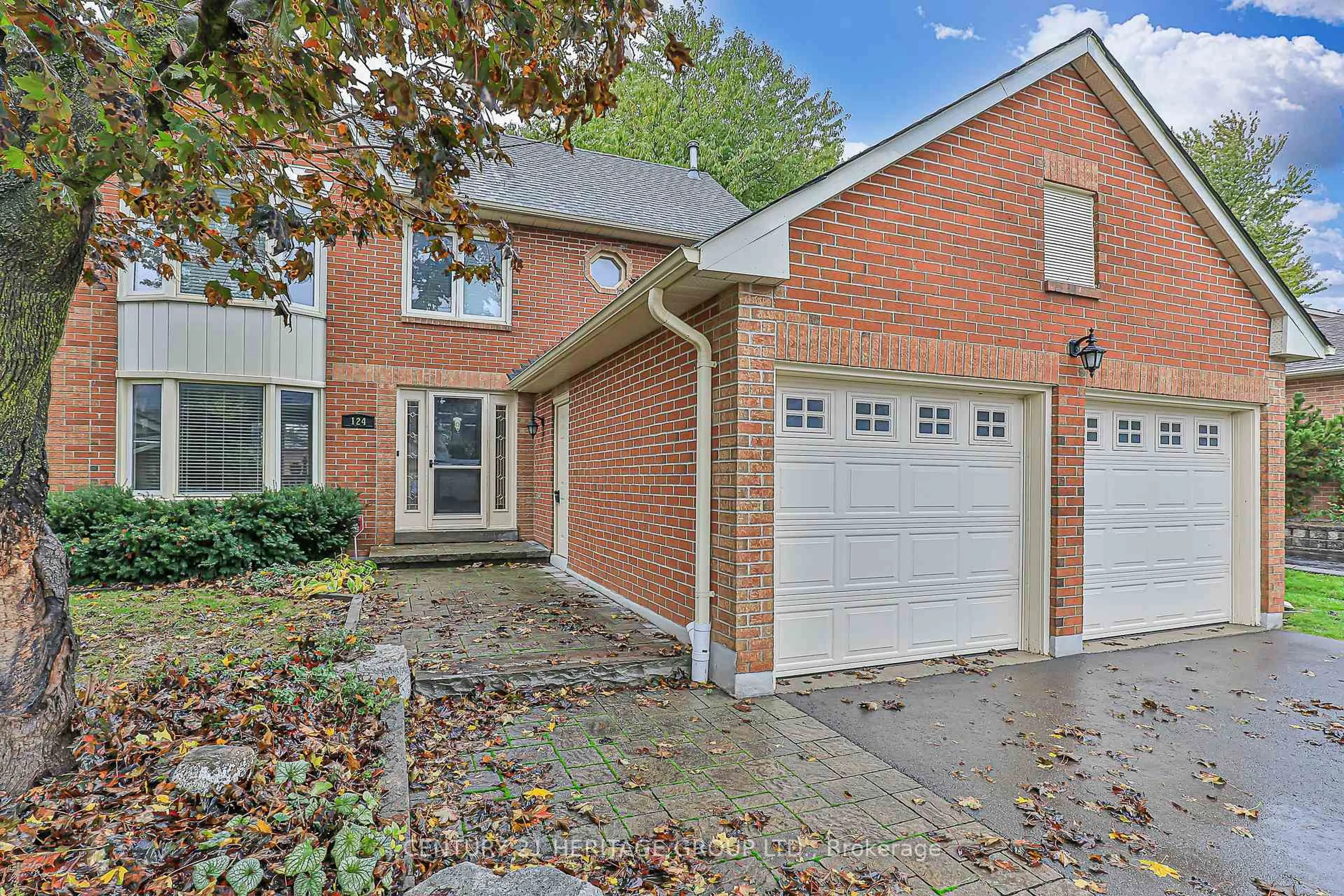 Home with brick exterior material, street for 124 John Bowser Cres, Newmarket Ontario L3Y 7P1