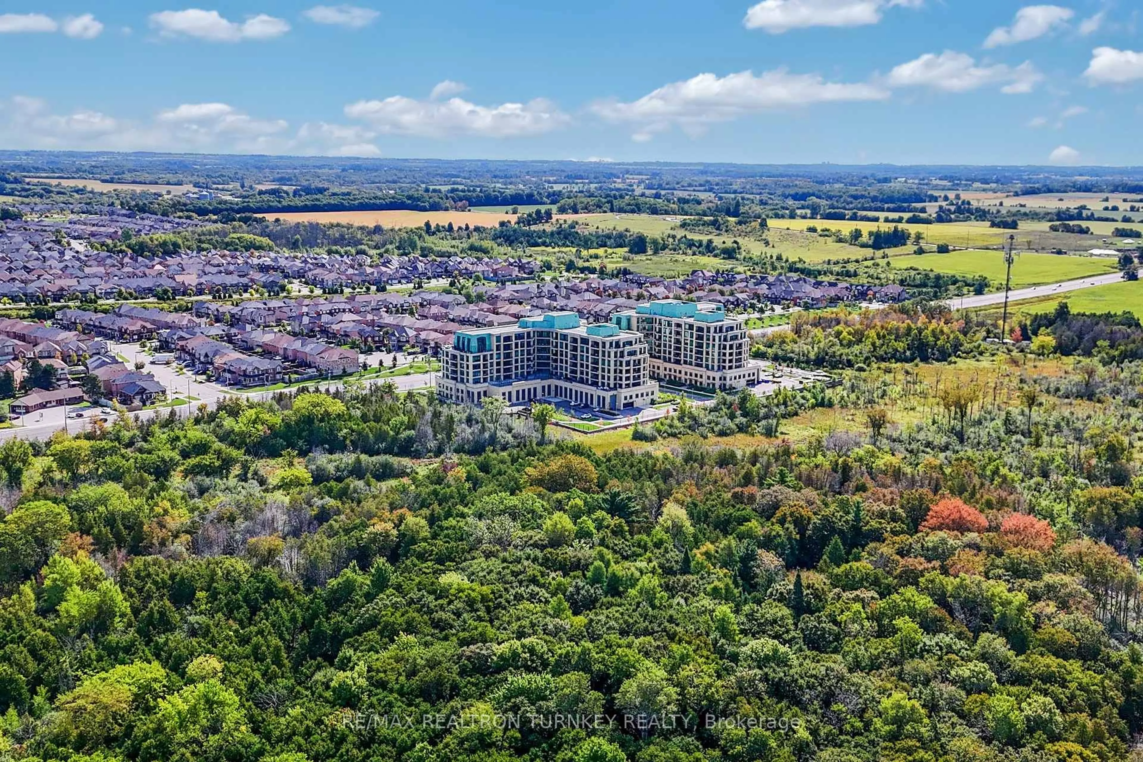 A pic from outside/outdoor area/front of a property/back of a property/a pic from drone, forest/trees view for 11782 Ninth Line #711, Whitchurch-Stouffville Ontario L4A 5E9