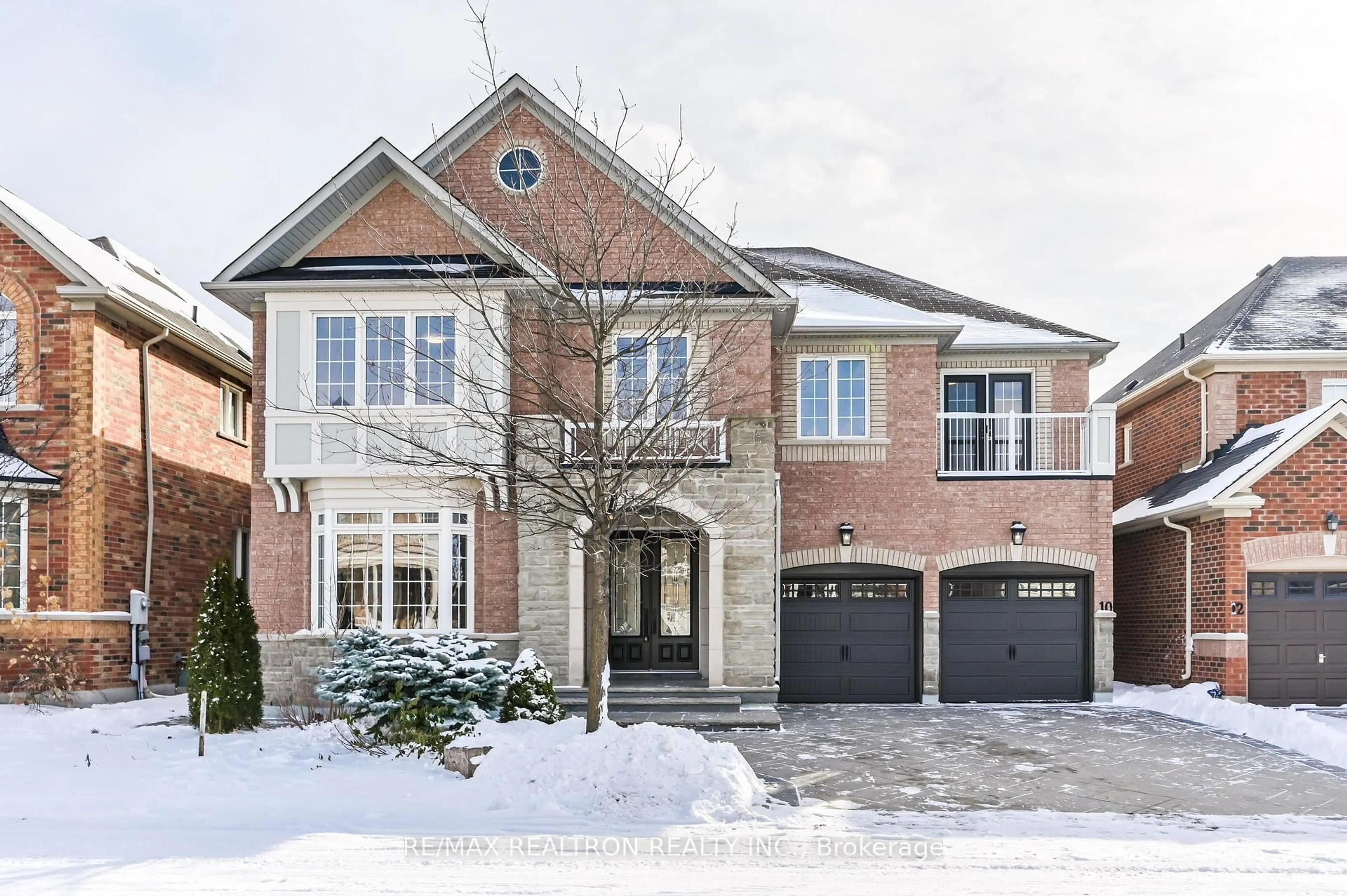 Home with brick exterior material, street for 10 Golden Meadow Dr, Markham Ontario L6E 1V8
