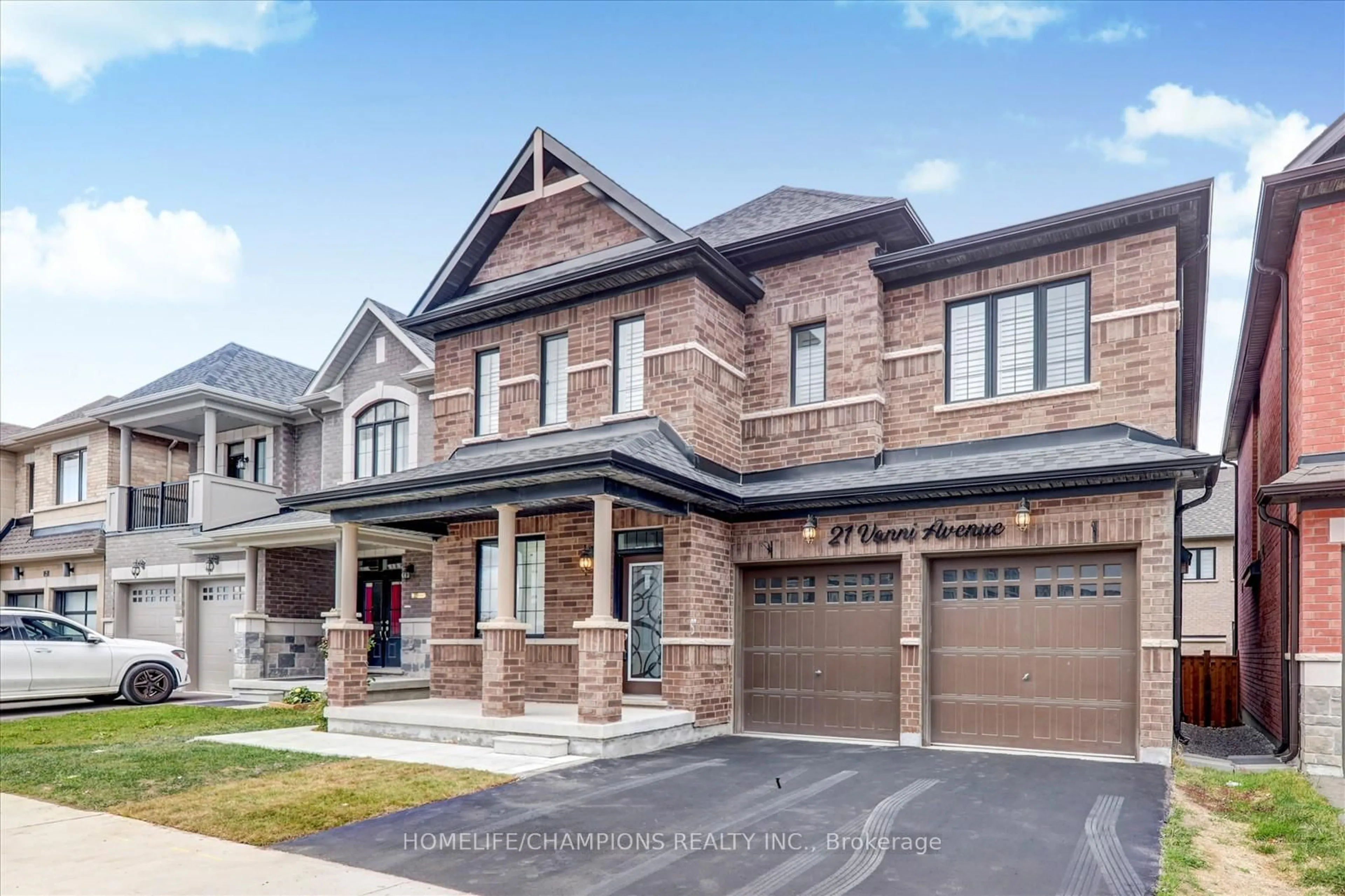 Home with brick exterior material, street for 21 Vanni Ave, Markham Ontario L3S 0G3