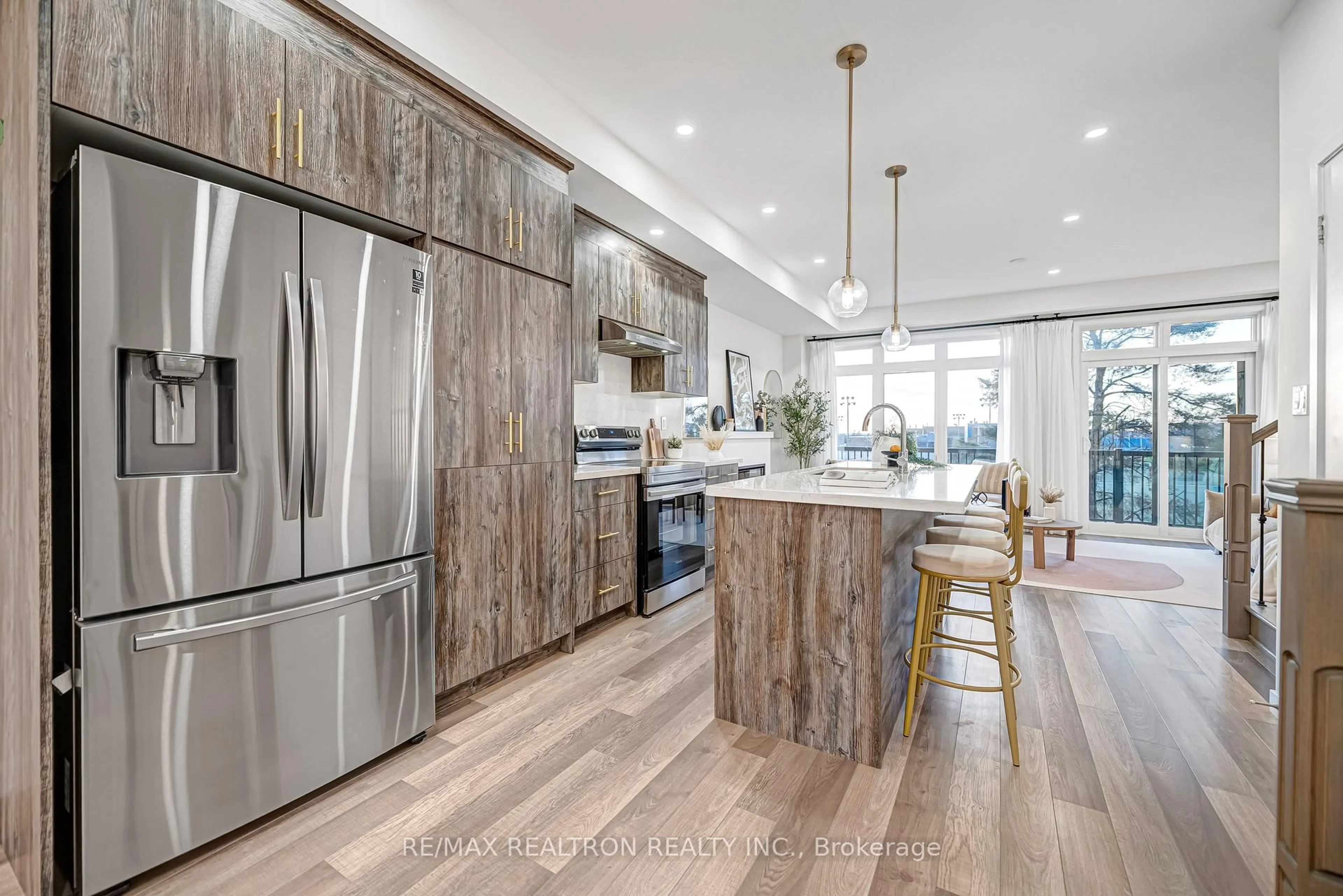 Open concept kitchen, wood/laminate floor for 54 Seacoasts Circ, Vaughan Ontario L6A 5B6