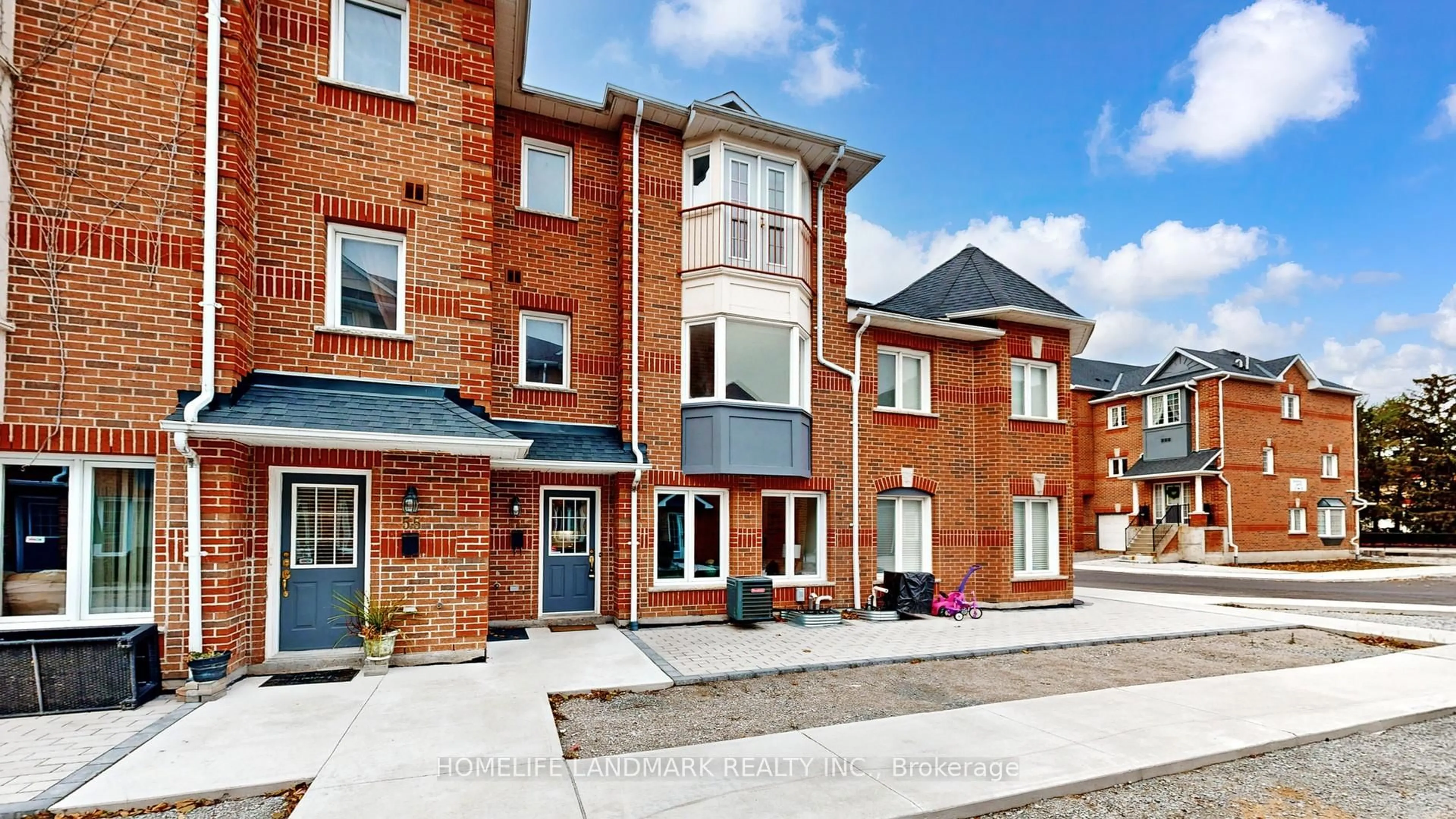 Home with brick exterior material, street for 151 Townsgate Dr #54, Vaughan Ontario L4J 8J7
