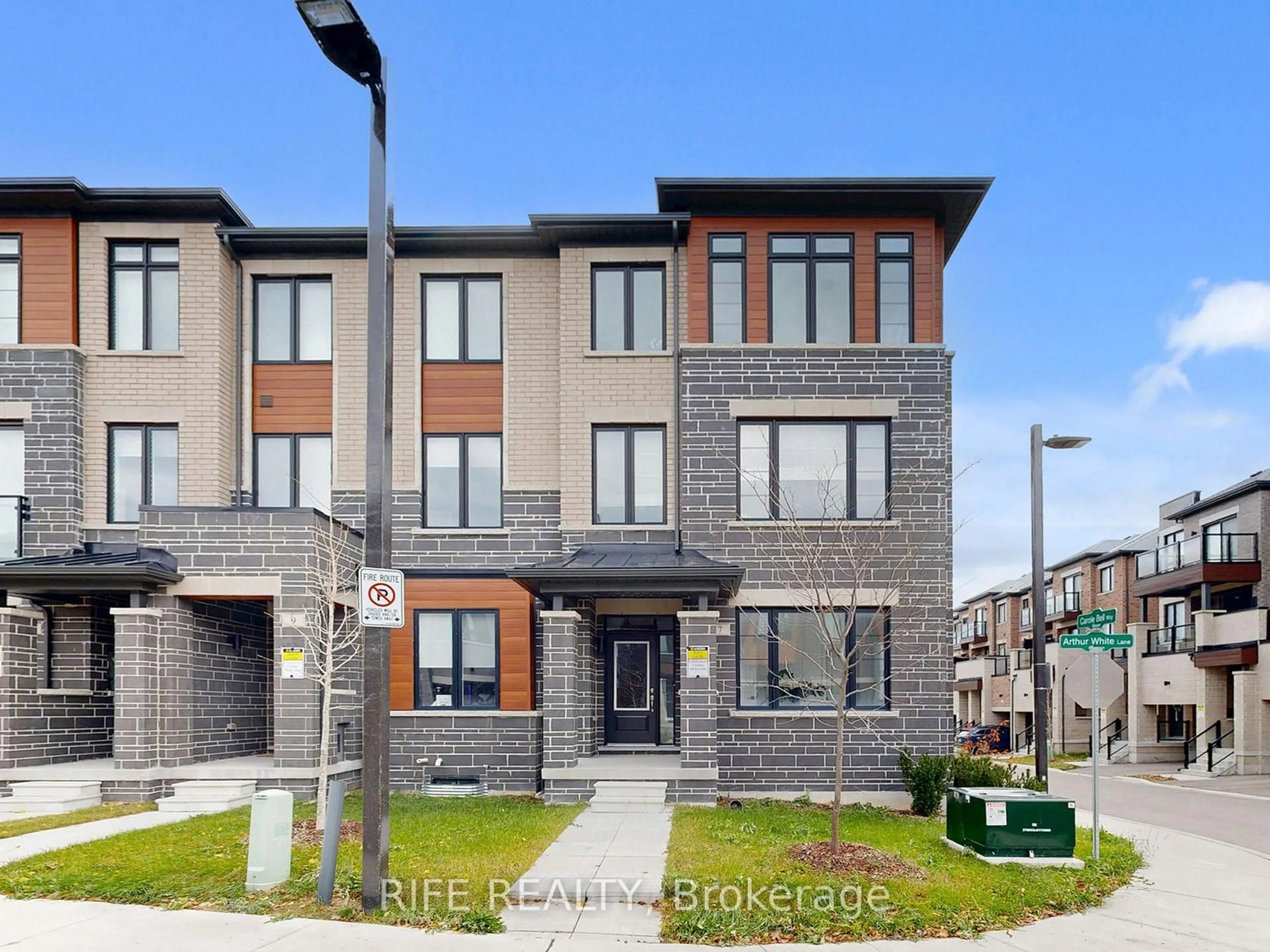 Home with brick exterior material, street for 7 Arthur White Lane, Markham Ontario L6E 0W2
