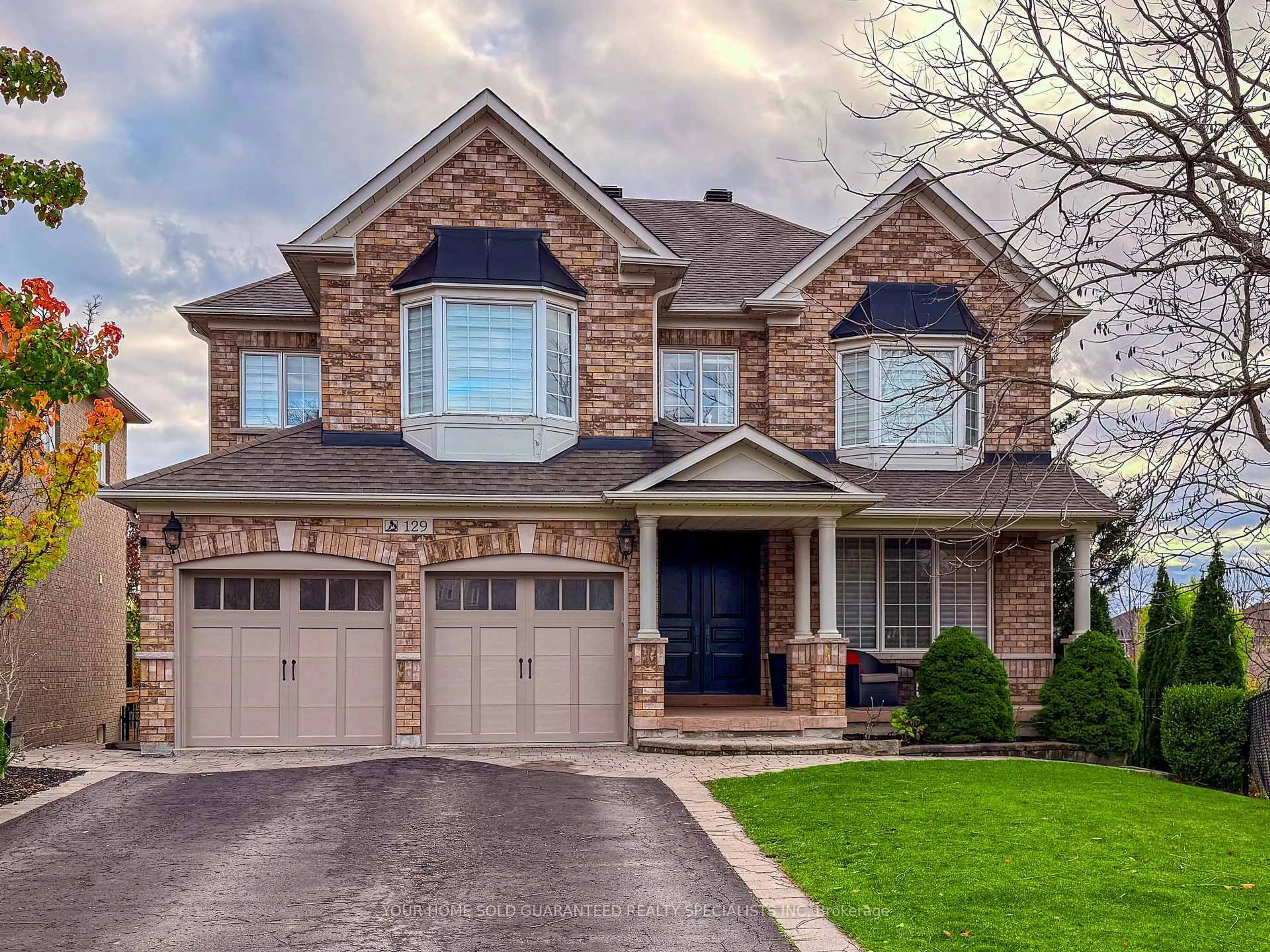 Home with brick exterior material, street for 129 Barberry Cres, Richmond Hill Ontario L4E 4S5