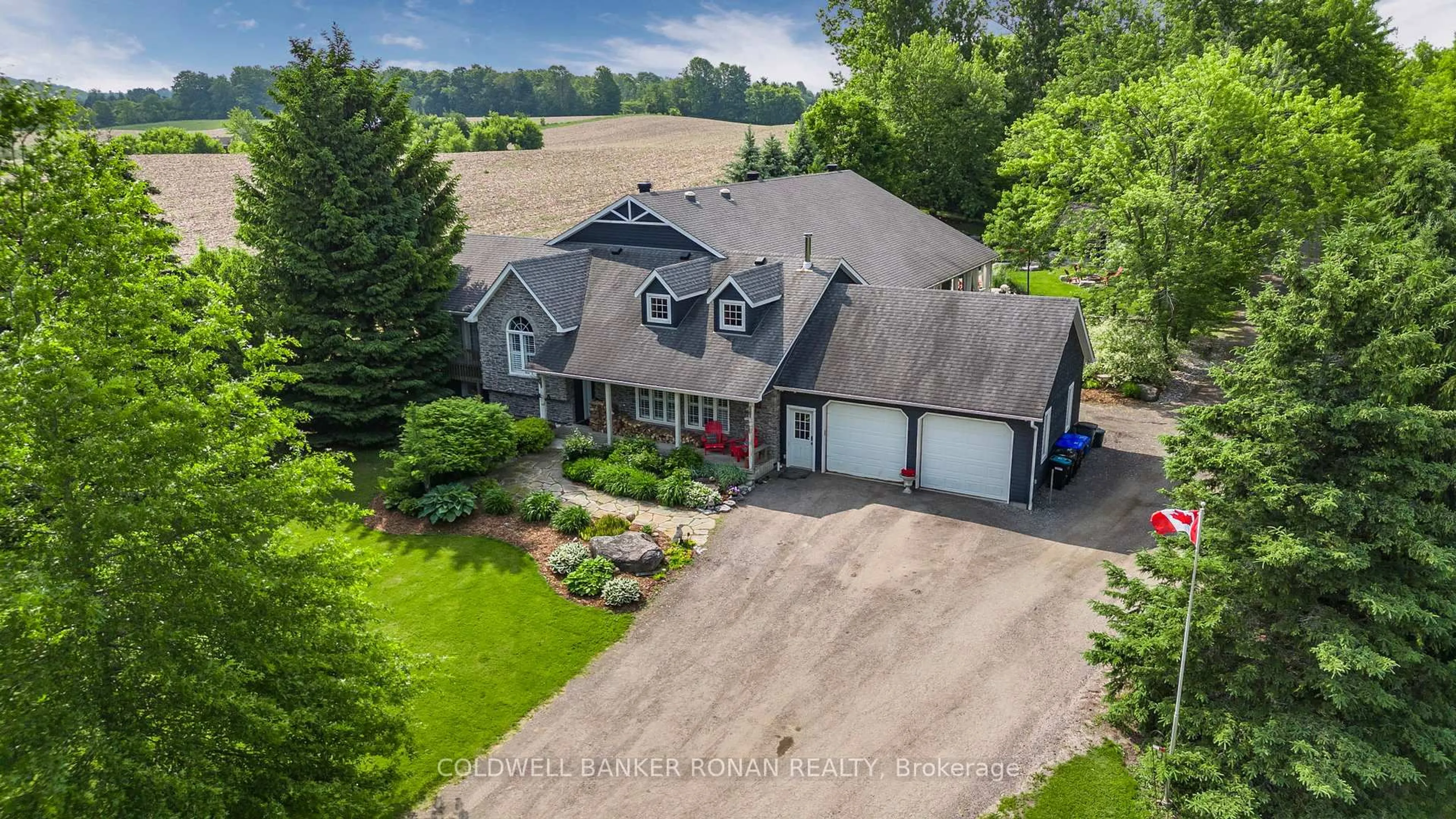 A pic from outside/outdoor area/front of a property/back of a property/a pic from drone, street for 6643 3rd Line, New Tecumseth Ontario L0G 1W0