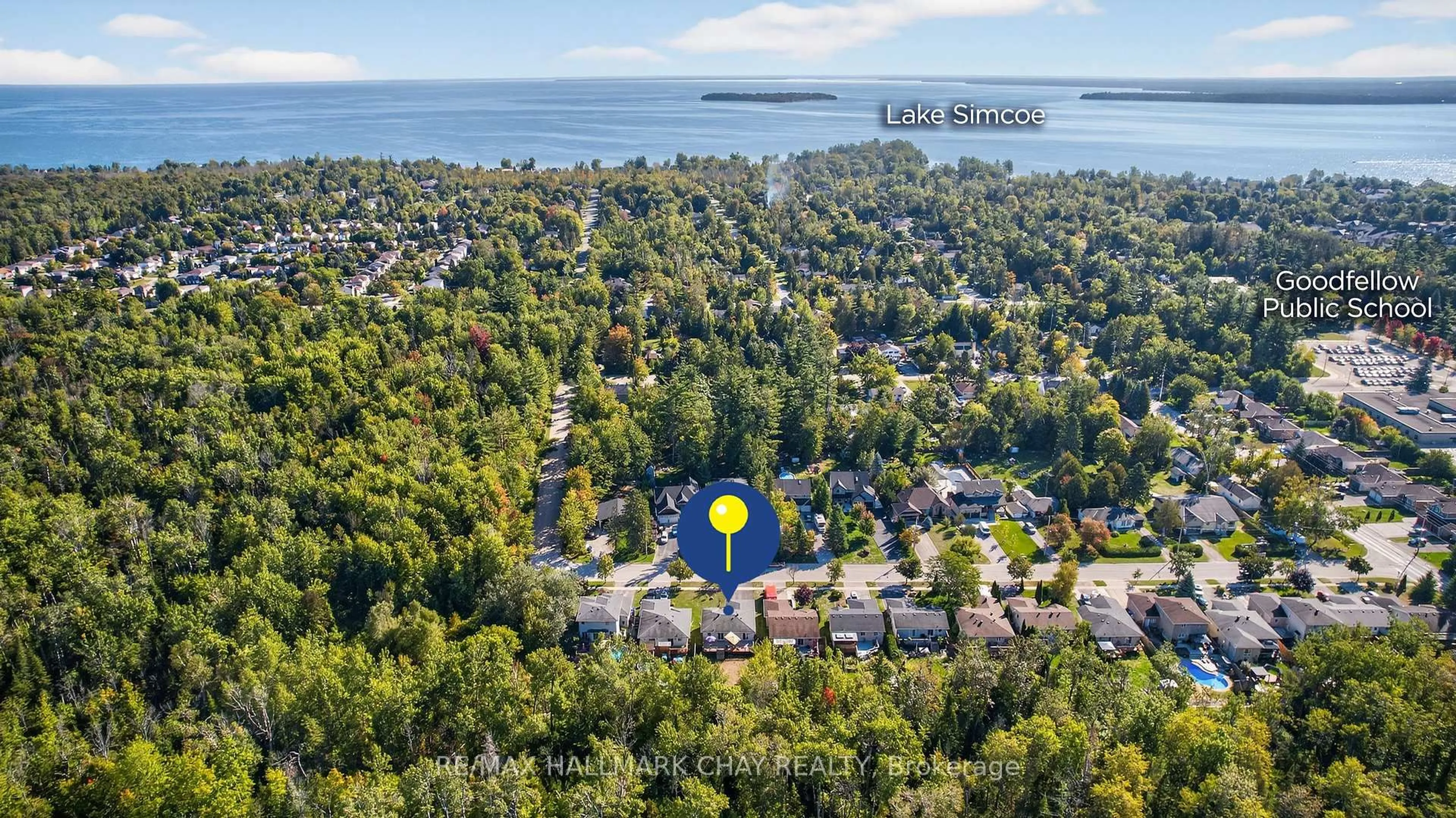 A pic from outside/outdoor area/front of a property/back of a property/a pic from drone, water/lake/river/ocean view for 2446 Ralph St, Innisfil Ontario L9S 2G4