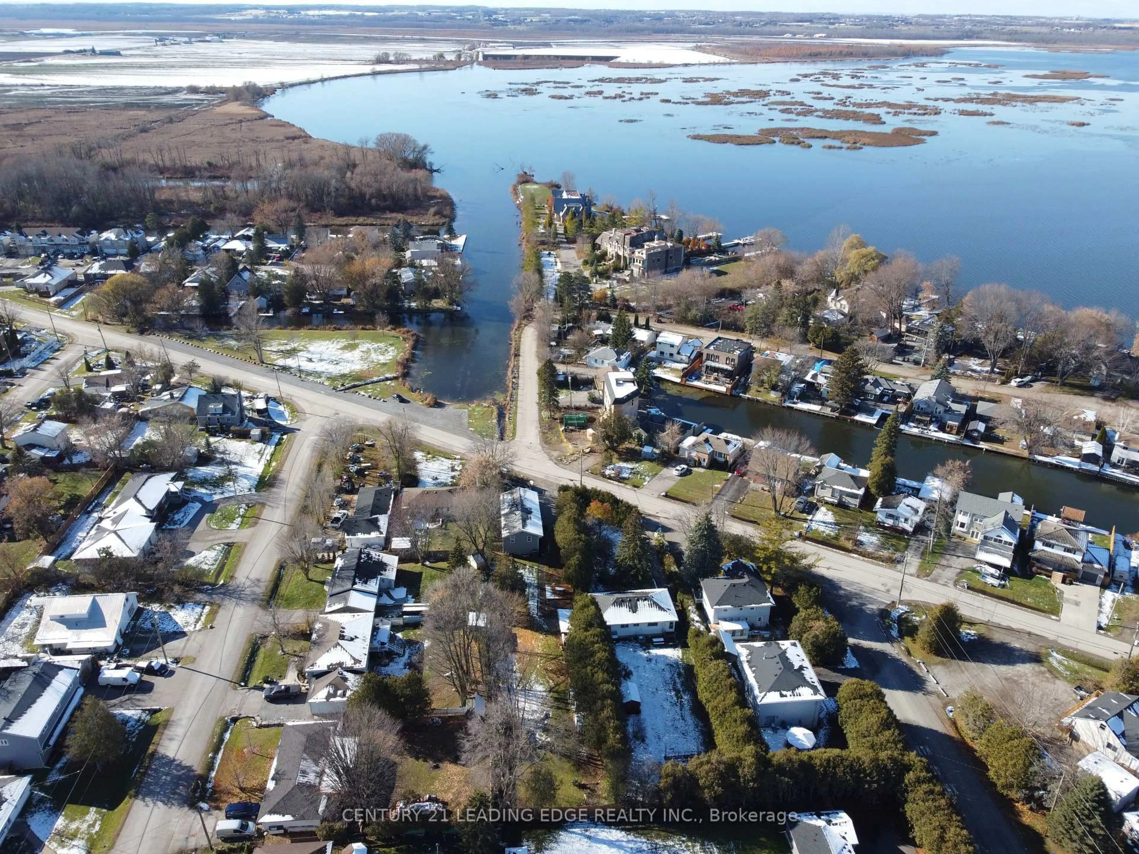 A pic from outside/outdoor area/front of a property/back of a property/a pic from drone, water/lake/river/ocean view for 623 Lake Drive South, Georgina Ontario L4P 1T6