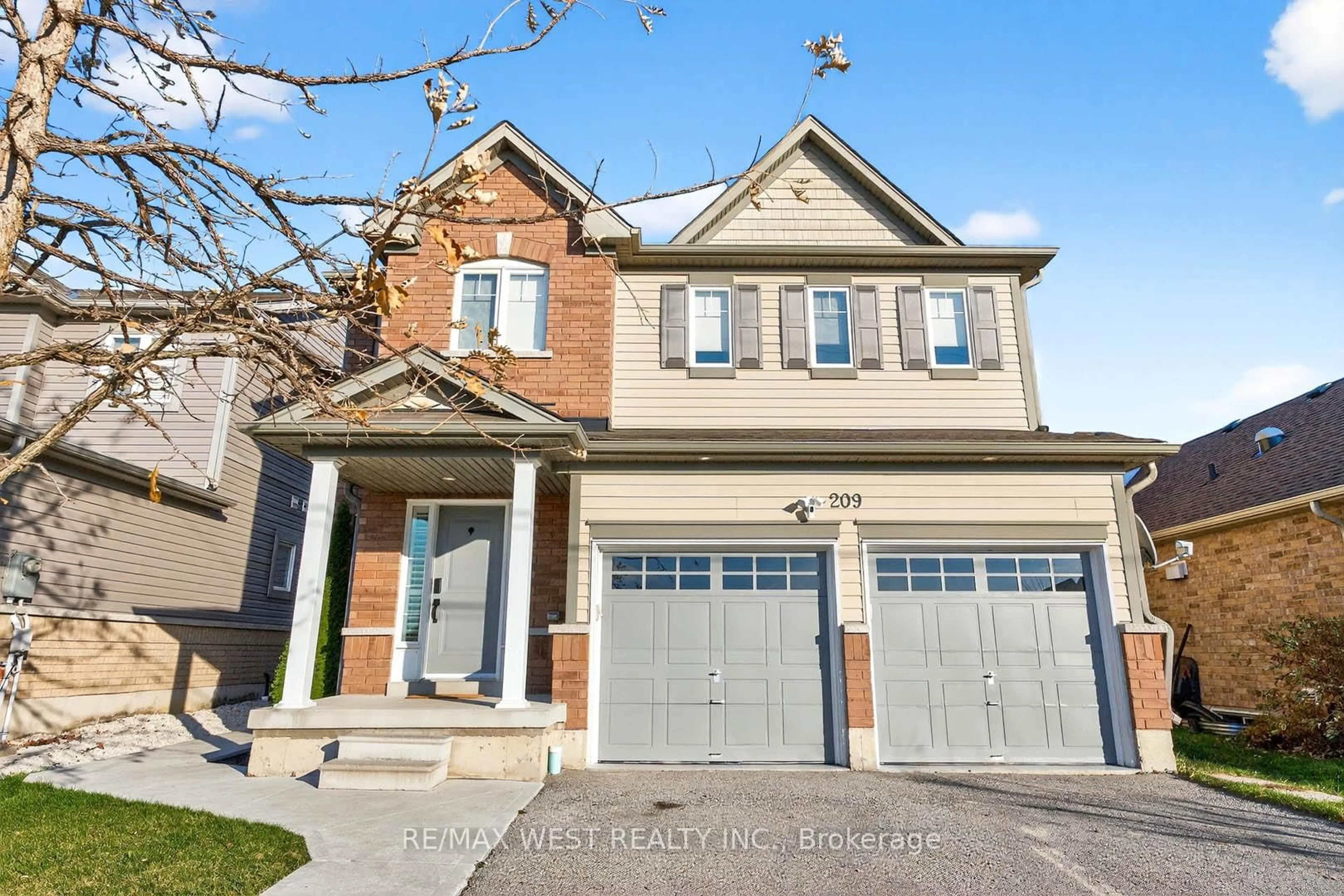 Home with brick exterior material, street for 209 King Street South St, New Tecumseth Ontario L9R 0A7