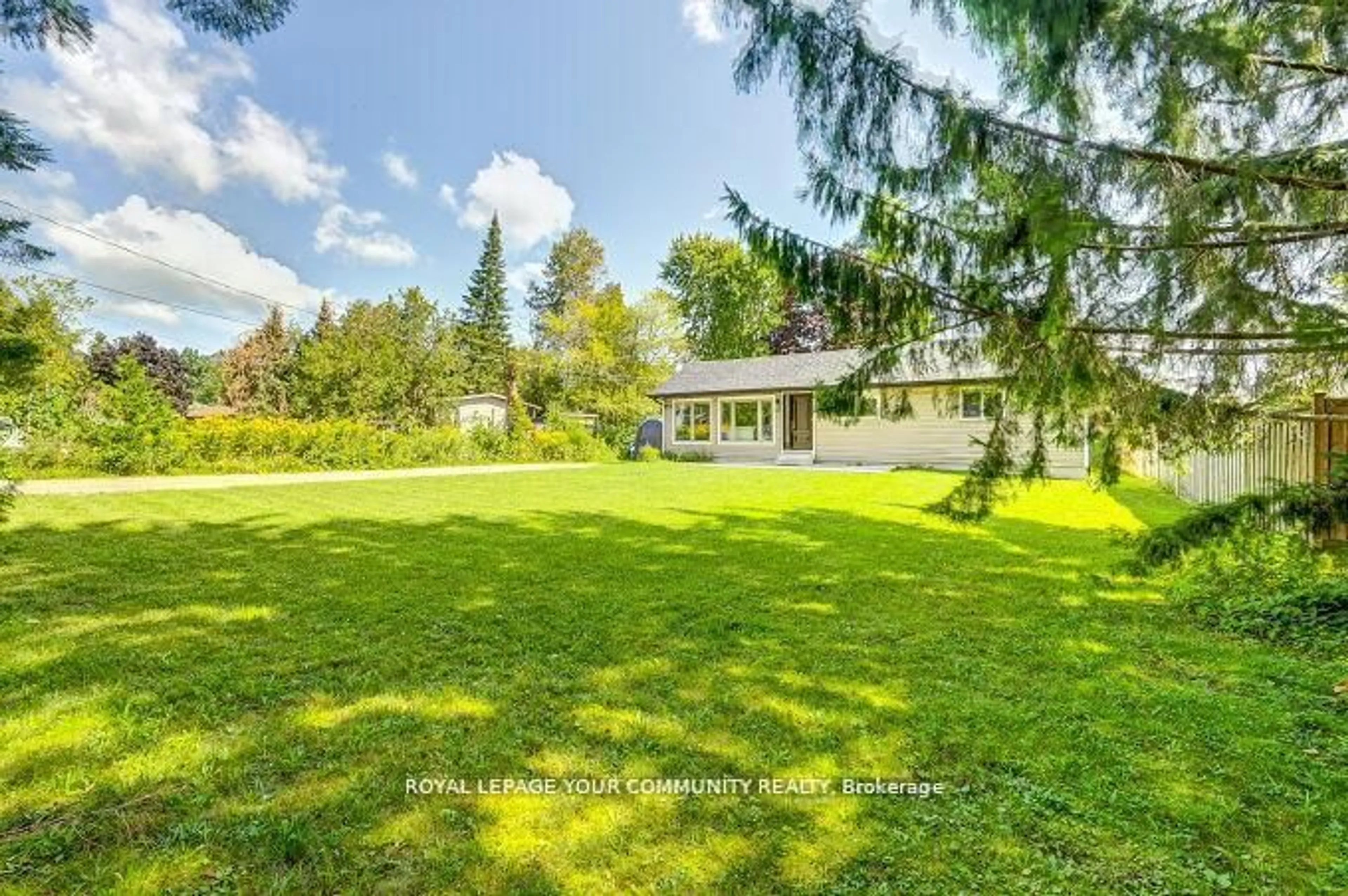 A pic from outside/outdoor area/front of a property/back of a property/a pic from drone, forest/trees view for 2309 Taylorwoods Blvd, Innisfil Ontario L9S 2E7