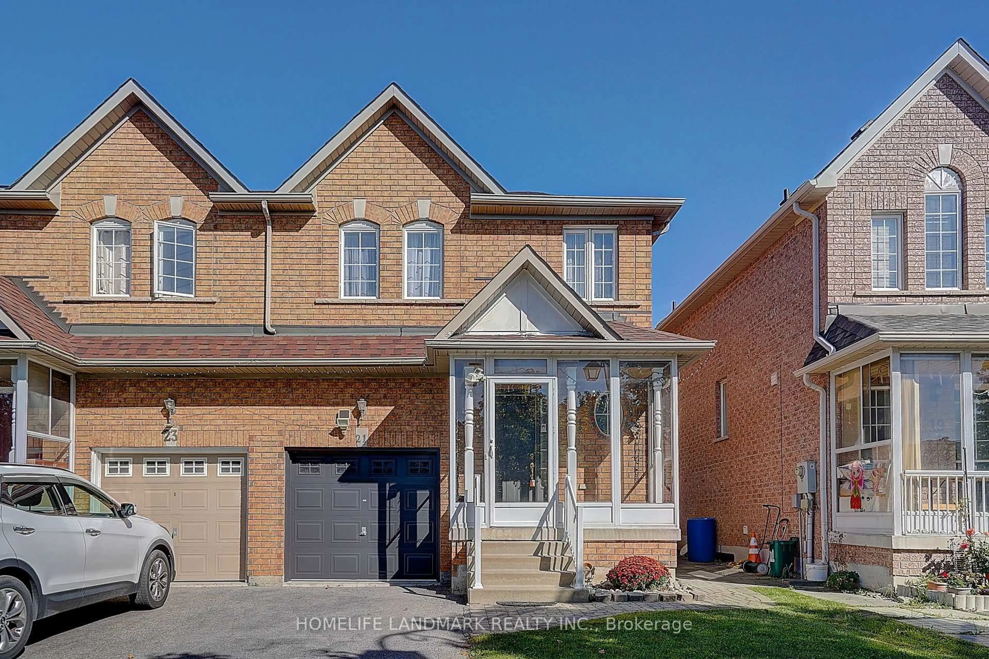 Home with brick exterior material, street for 21 Raintree Dr, Markham Ontario L3R 5T9