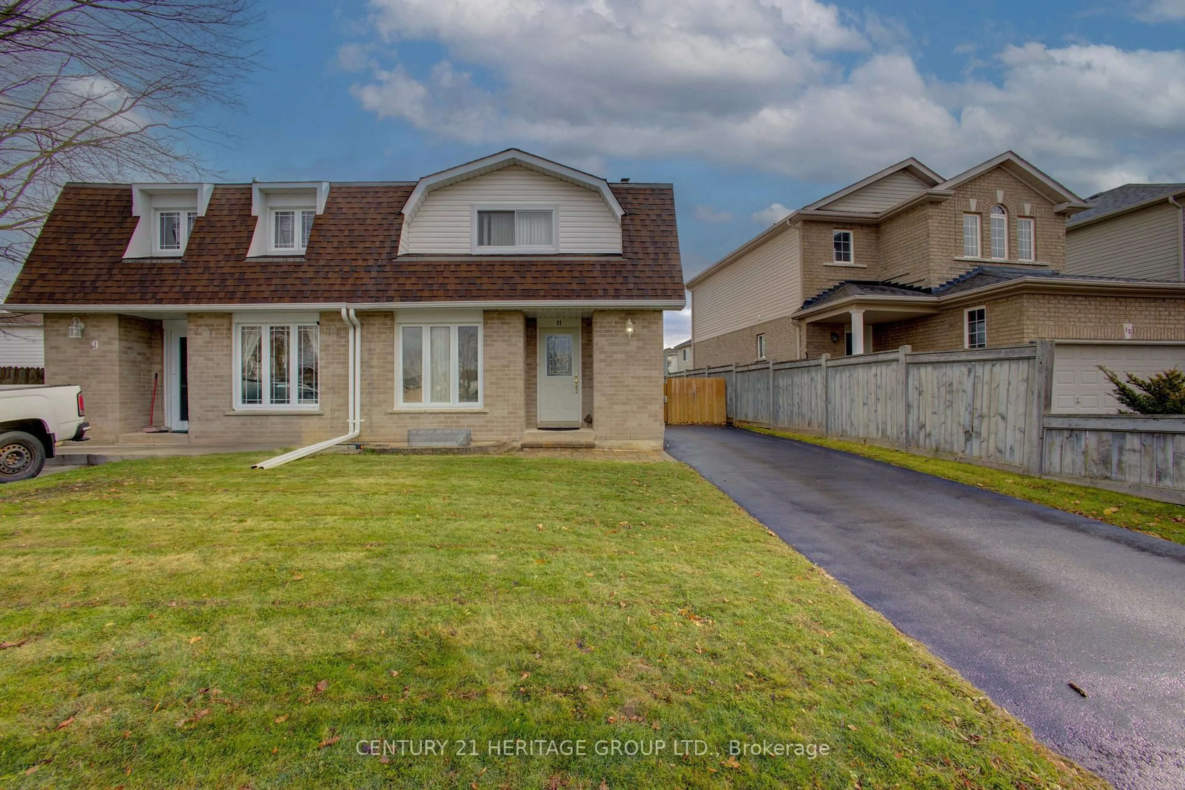 Home with vinyl exterior material, street for 11 Knight St, New Tecumseth Ontario L9R 1C1