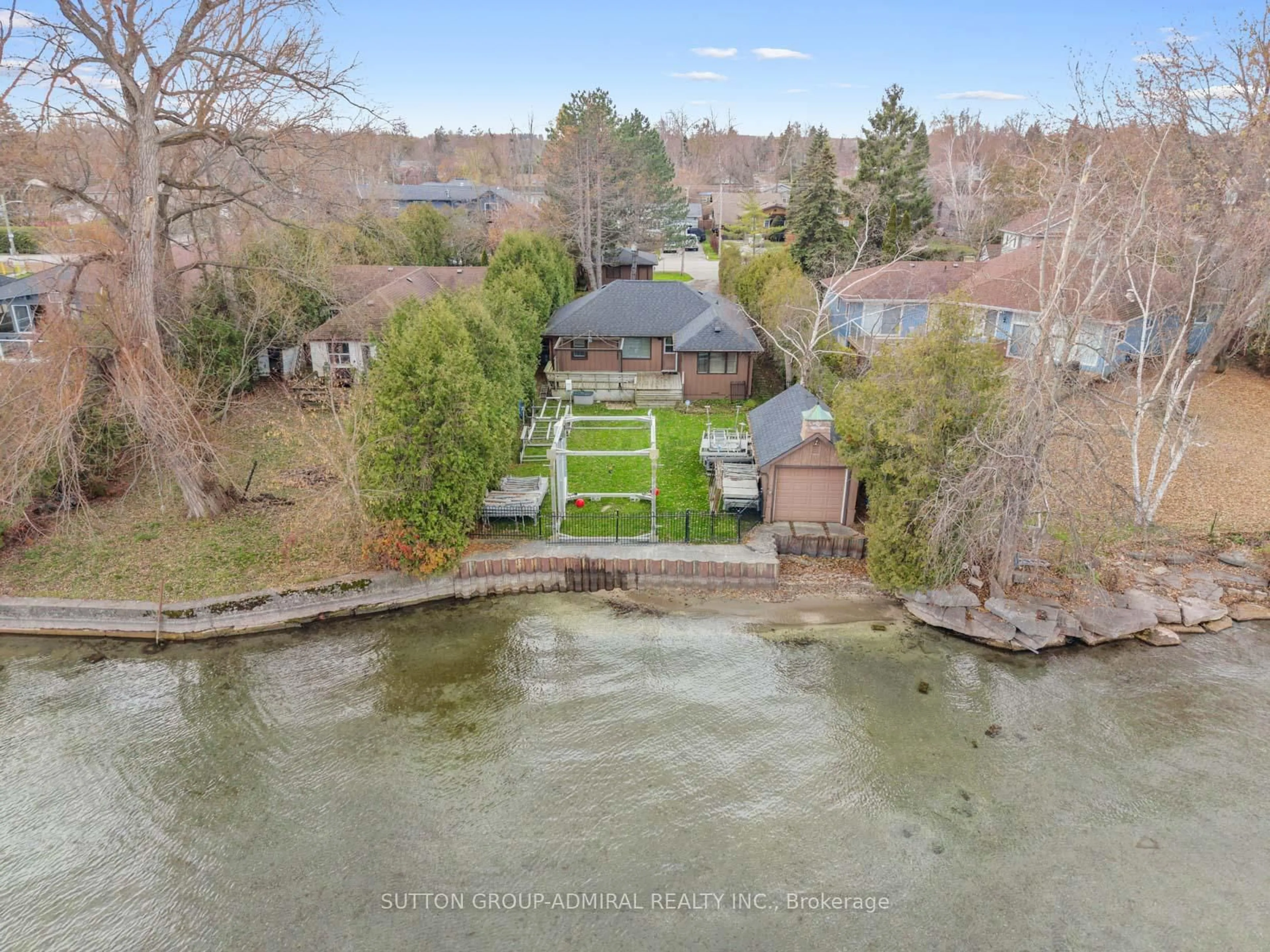 A pic from outside/outdoor area/front of a property/back of a property/a pic from drone, water/lake/river/ocean view for 1273 Maple Rd, Innisfil Ontario L9S 2Z9