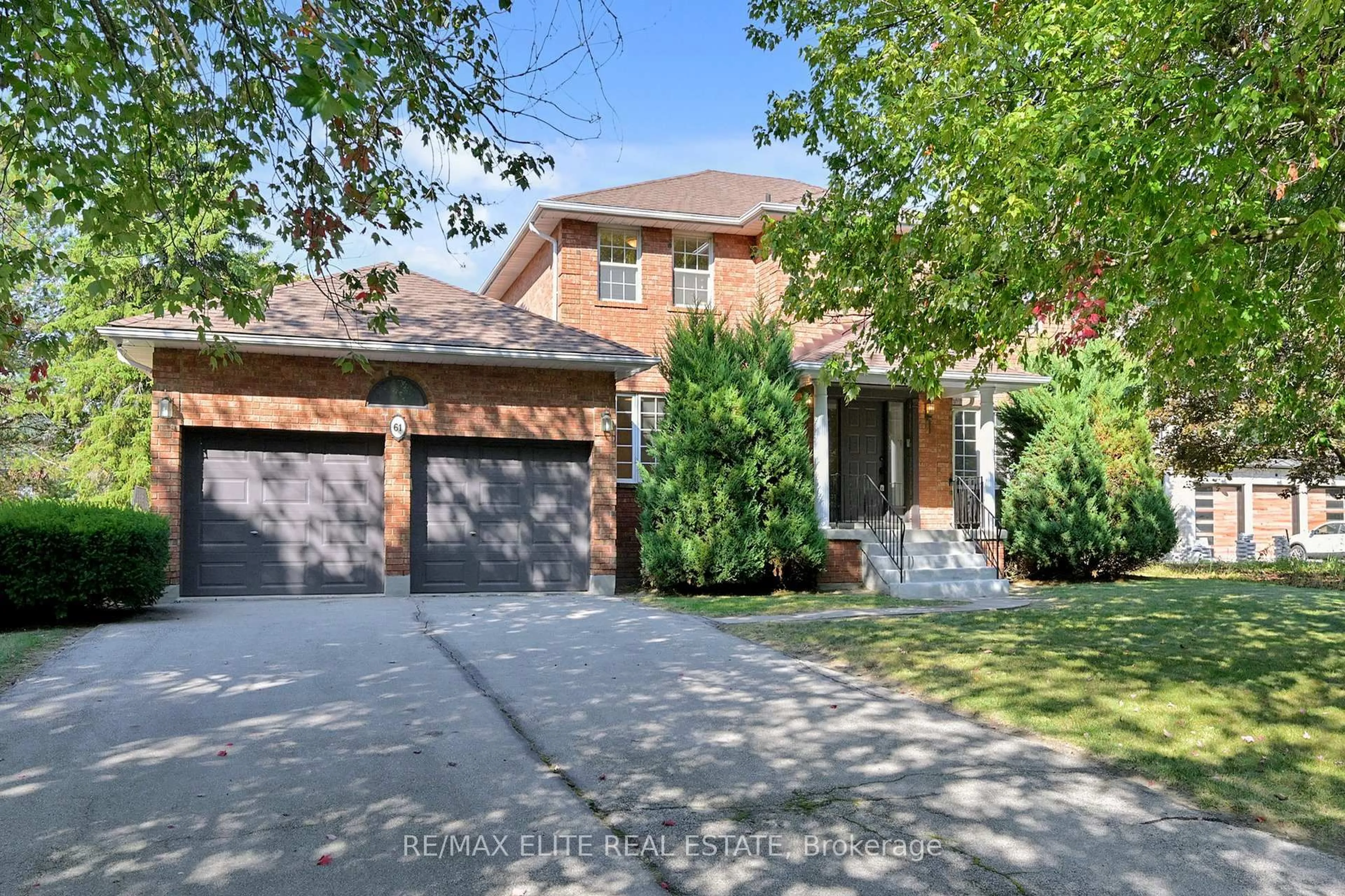 Home with brick exterior material, street for 61 Beaufort Hills Rd, Richmond Hill Ontario L4E 2N3
