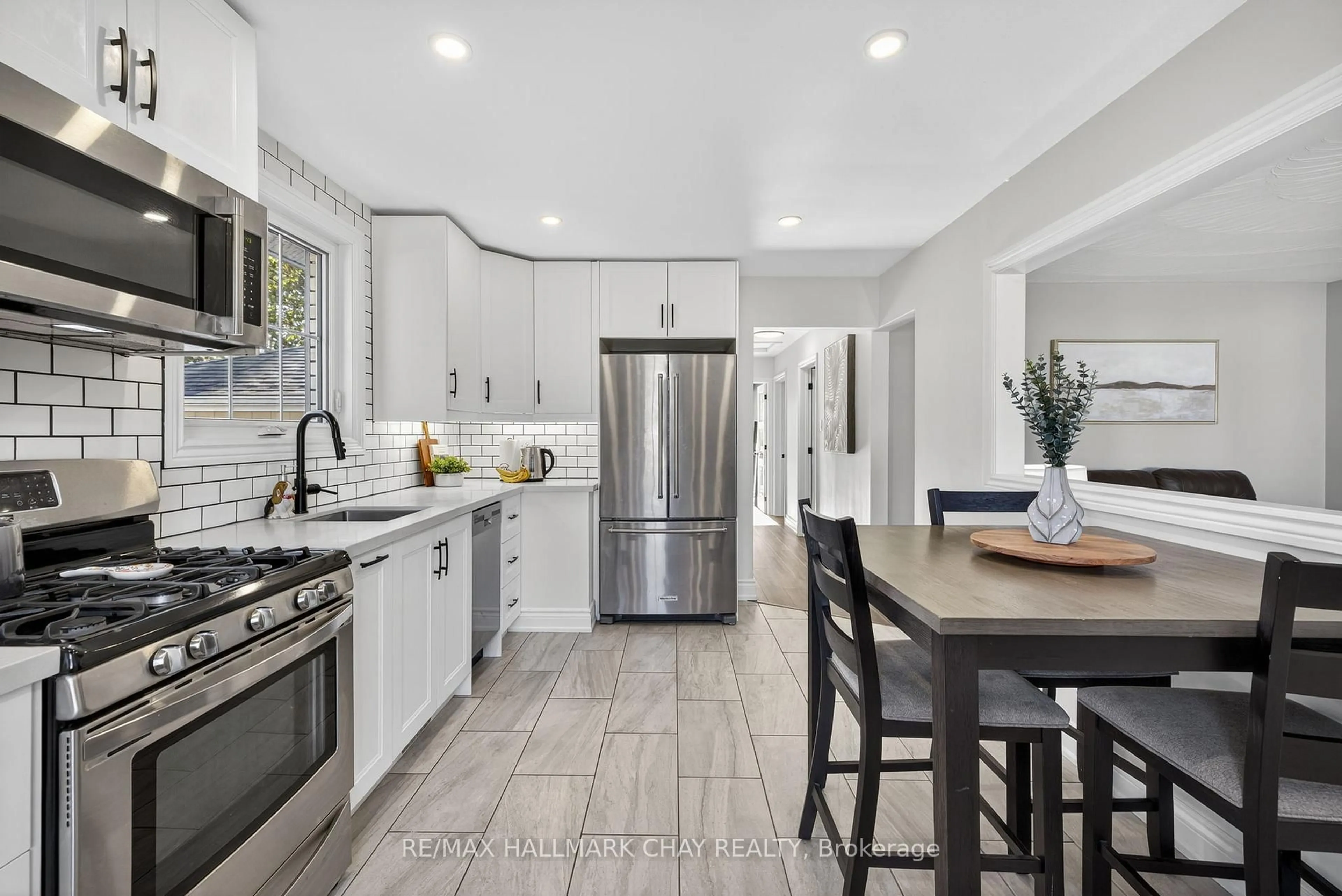 Contemporary kitchen, ceramic/tile floor for 104 Kulpin Ave, Bradford West Gwillimbury Ontario L3Z 1T7