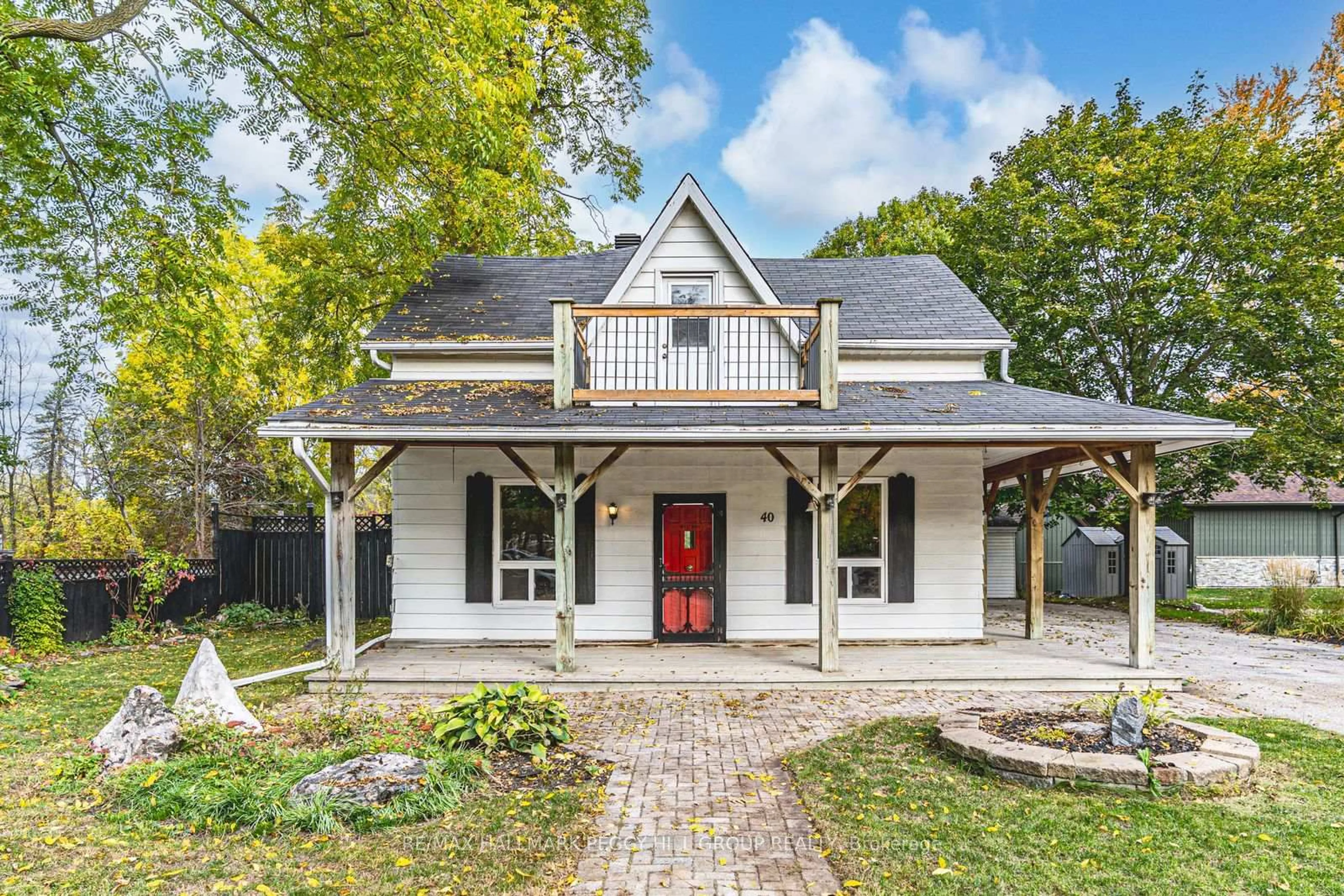 Home with brick exterior material, street for 40 Queen St, New Tecumseth Ontario L9R 1L2