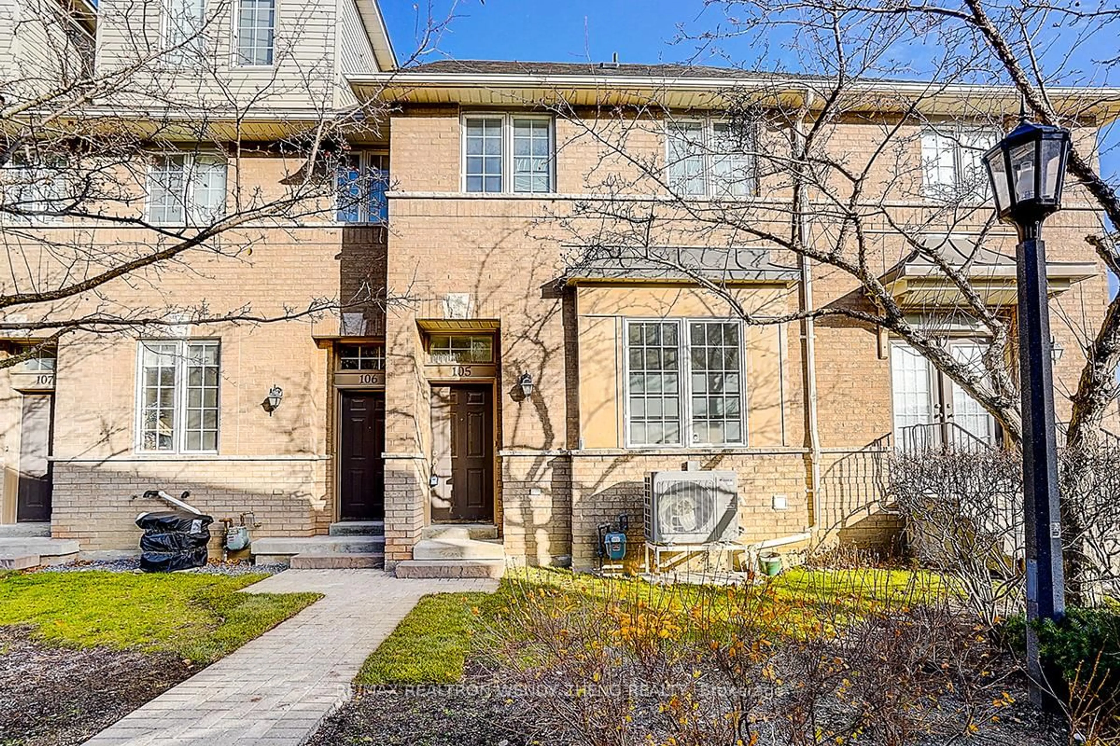 Home with brick exterior material, street for 23 Observatory Lane #105, Richmond Hill Ontario L4C 0M7
