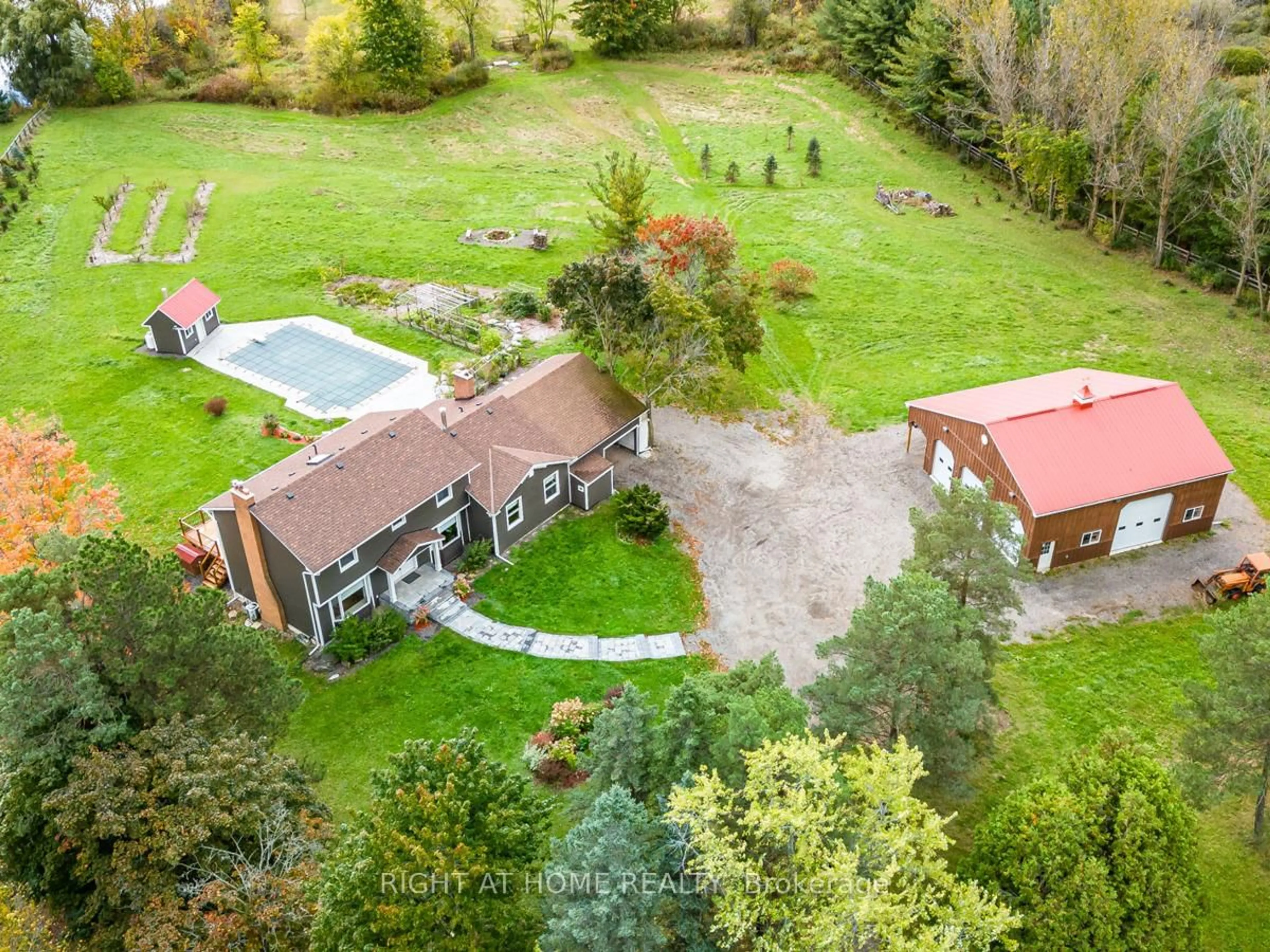 A pic from outside/outdoor area/front of a property/back of a property/a pic from drone, unknown for 7975 18th Sdrd, King Ontario L0G 1T0