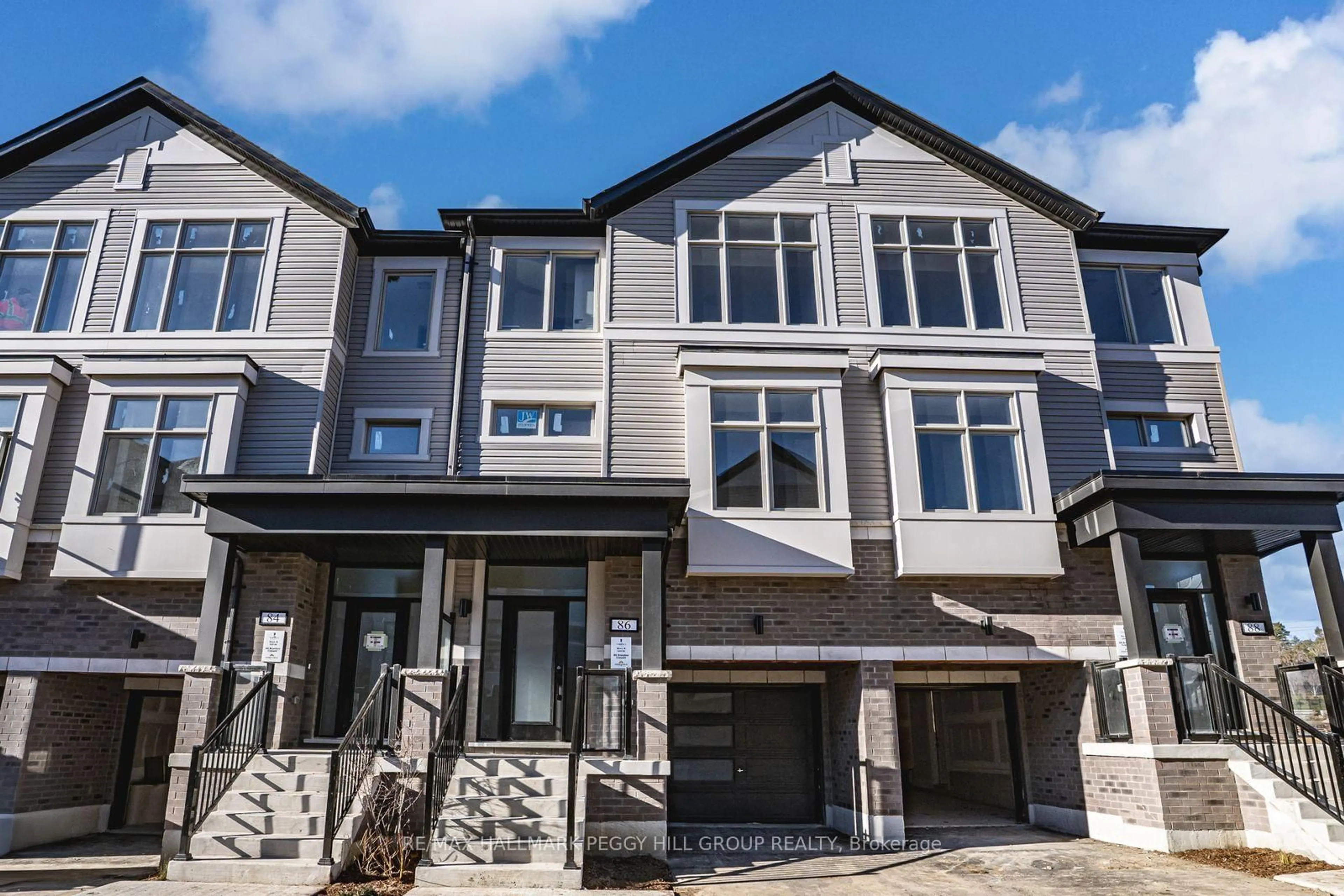 Home with vinyl exterior material, street for 86 Brandon Cres, New Tecumseth Ontario L0G 1W0