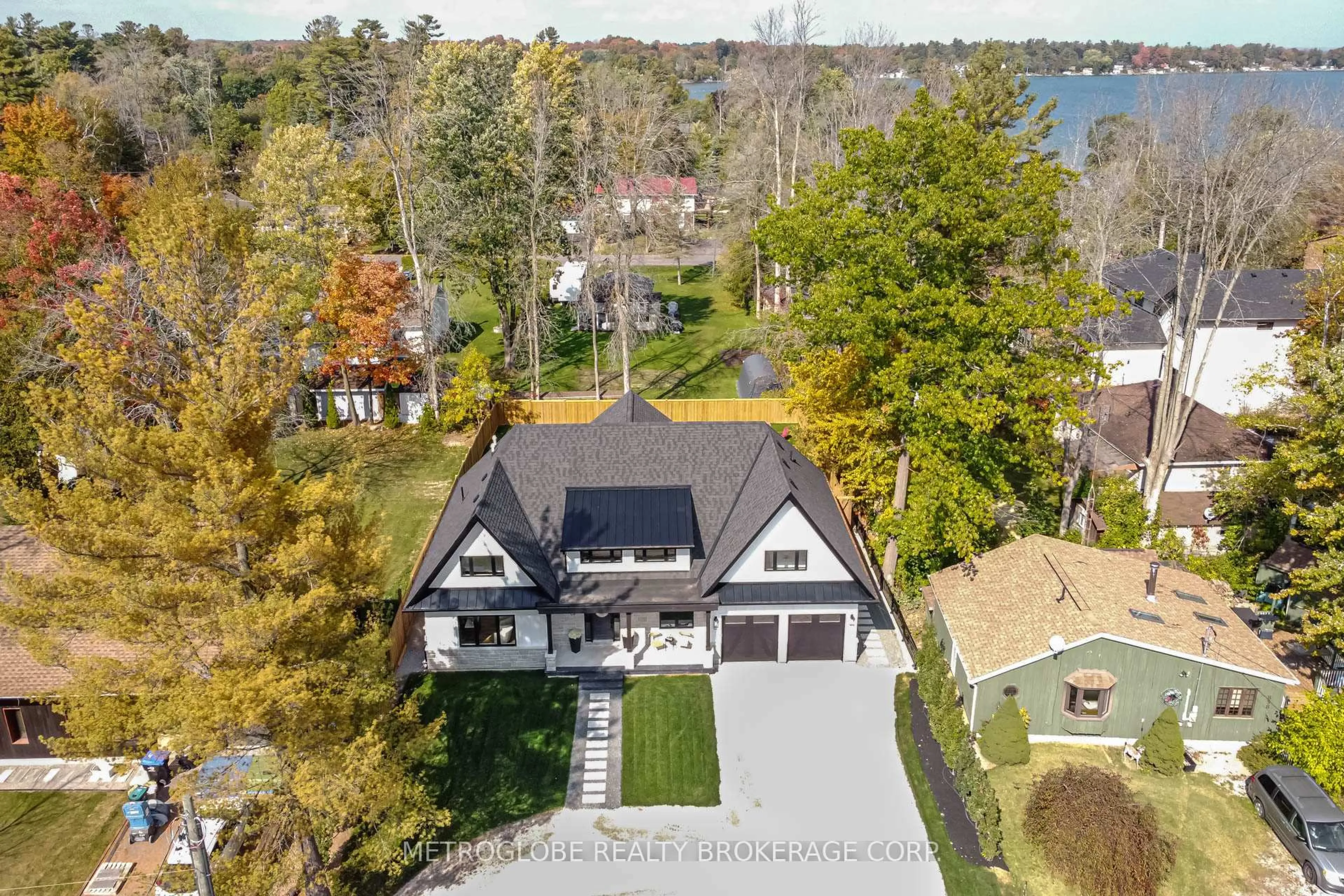 A pic from outside/outdoor area/front of a property/back of a property/a pic from drone, water/lake/river/ocean view for 862 Kennedy Rd, Innisfil Ontario L9S 4M5