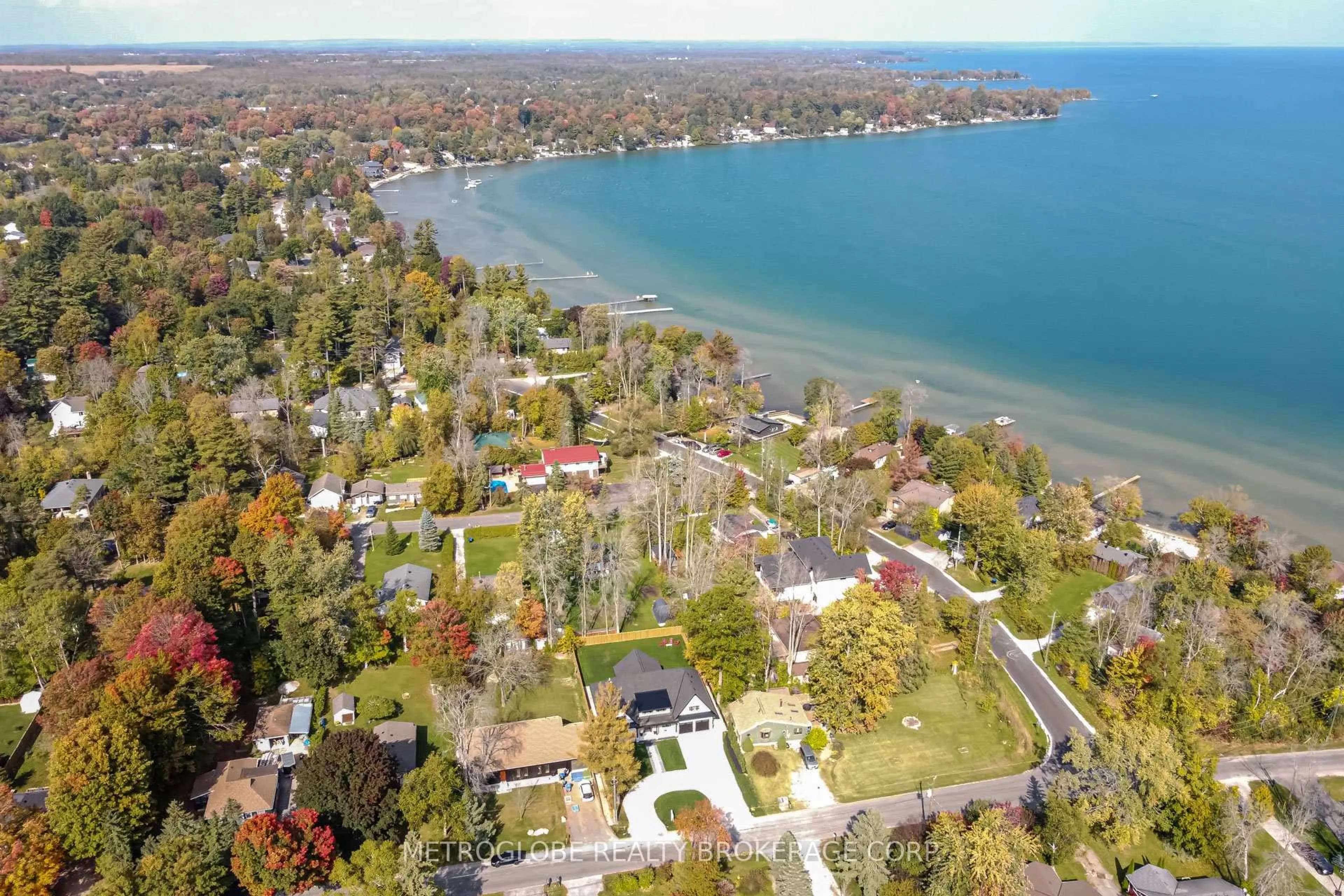 A pic from outside/outdoor area/front of a property/back of a property/a pic from drone, water/lake/river/ocean view for 862 Kennedy Rd, Innisfil Ontario L9S 4M5