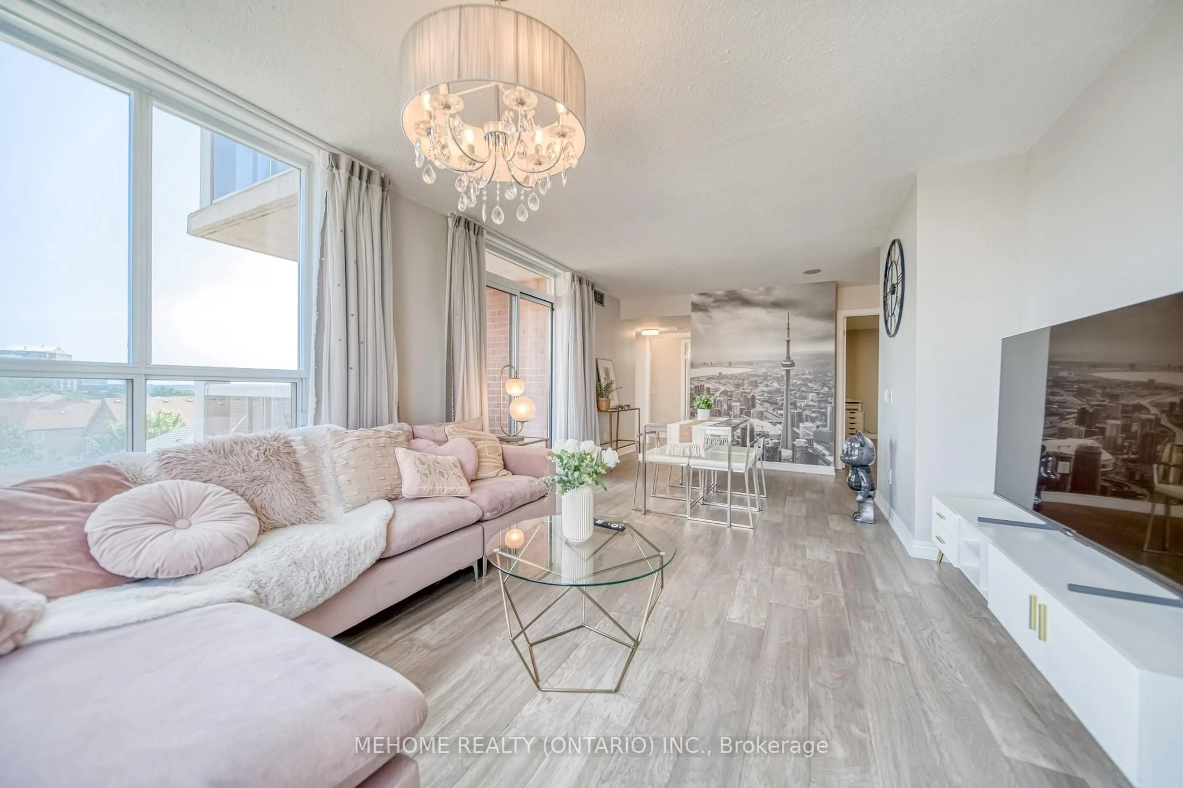 Living room with furniture, wood/laminate floor for 25 Times Ave #610, Markham Ontario L3T 7X5