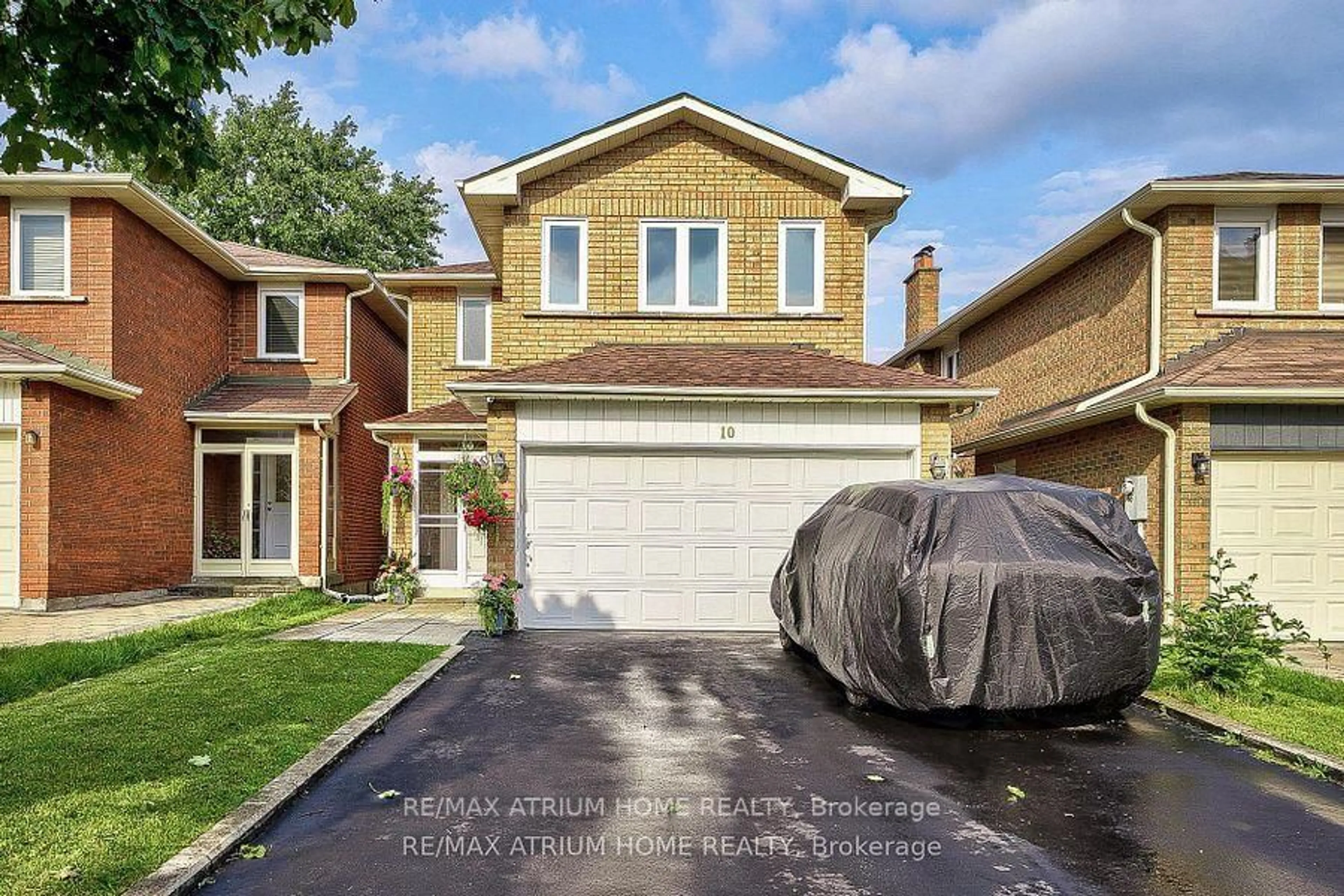 Home with brick exterior material, street for 10 Olivewood Dr, Markham Ontario L3S 3E3