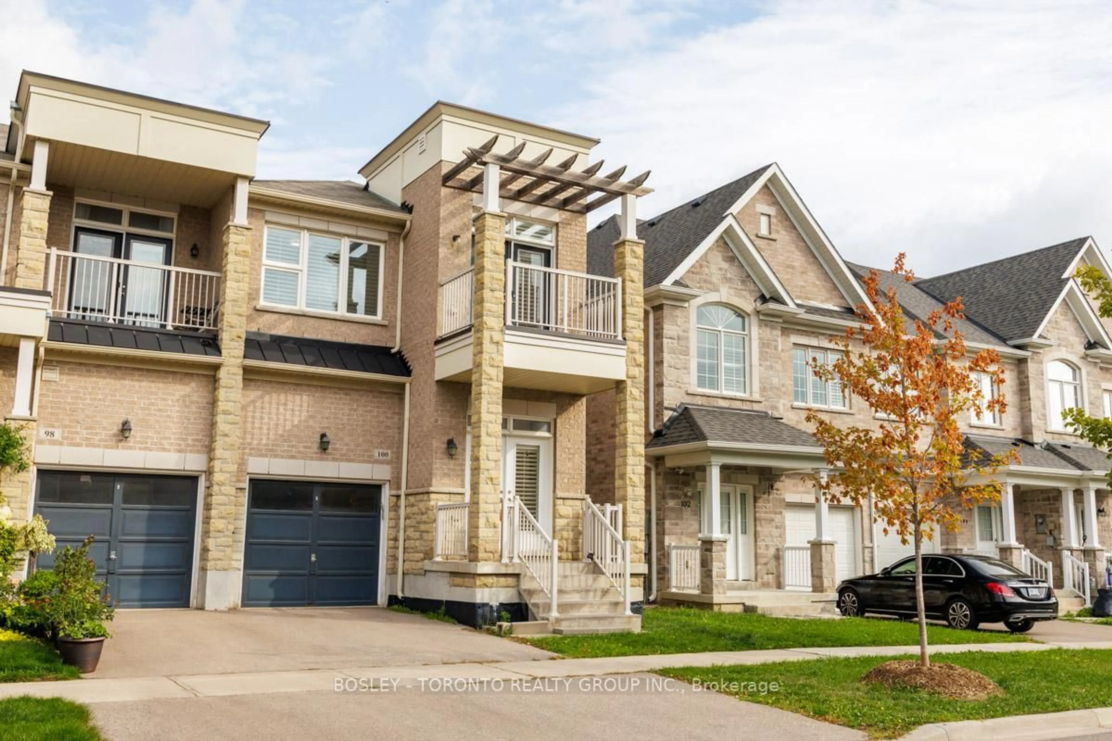 Home with brick exterior material, street for 100 Ian Baron Ave, Markham Ontario L3R 5C3