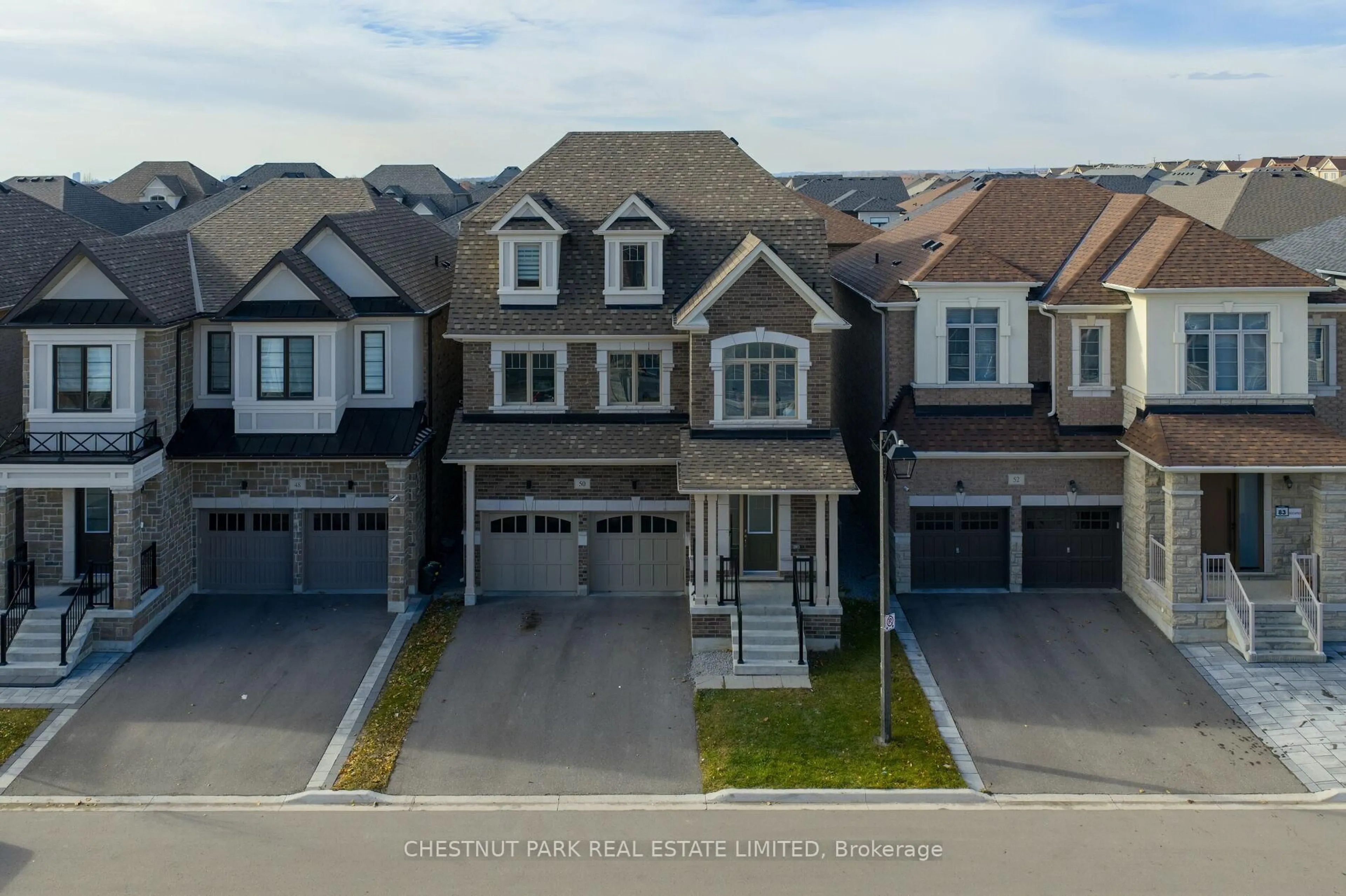 A pic from outside/outdoor area/front of a property/back of a property/a pic from drone, street for 50 Willow St, Markham Ontario L6E 0W1