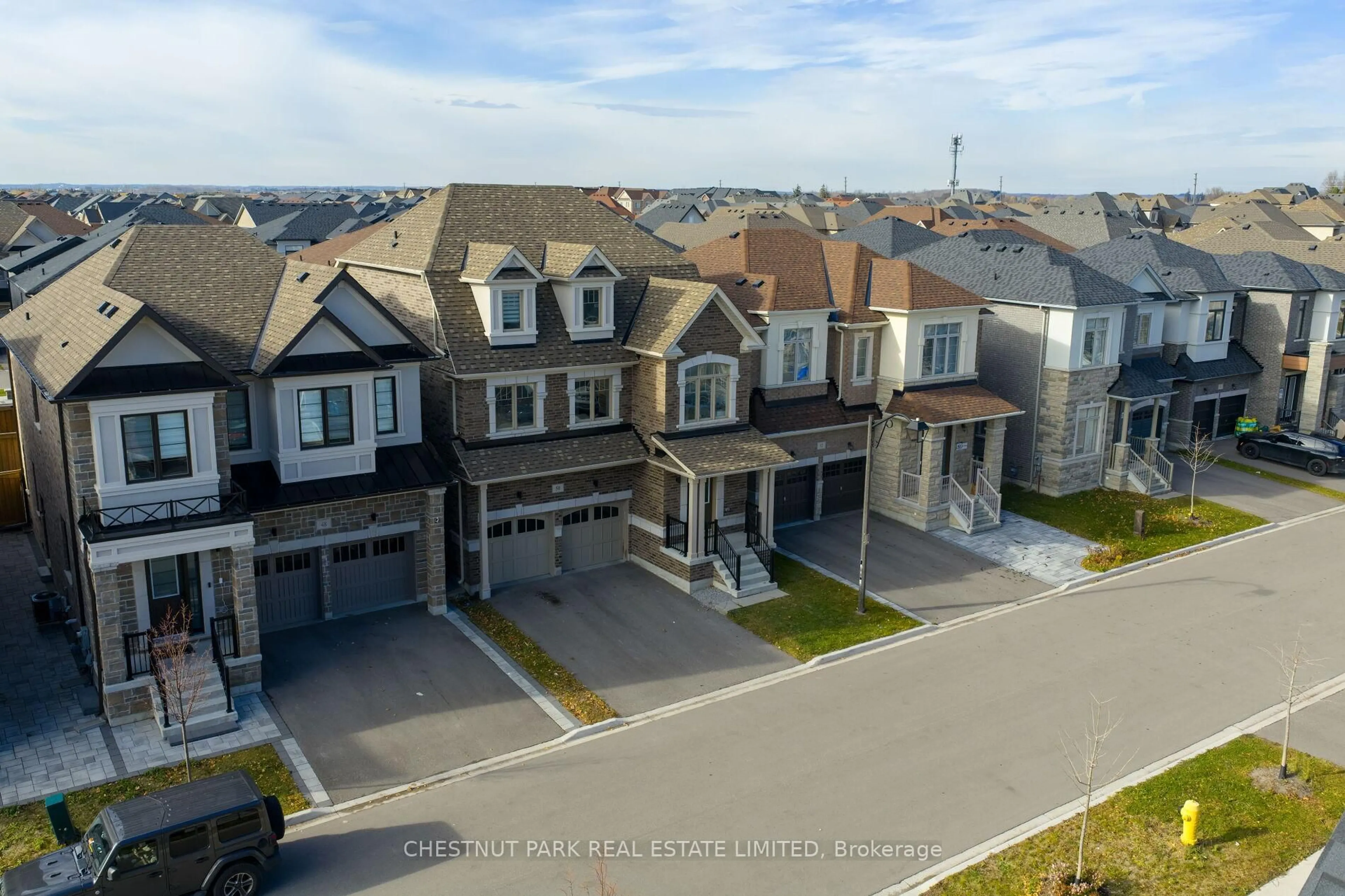 A pic from outside/outdoor area/front of a property/back of a property/a pic from drone, street for 50 Willow St, Markham Ontario L6E 0W1