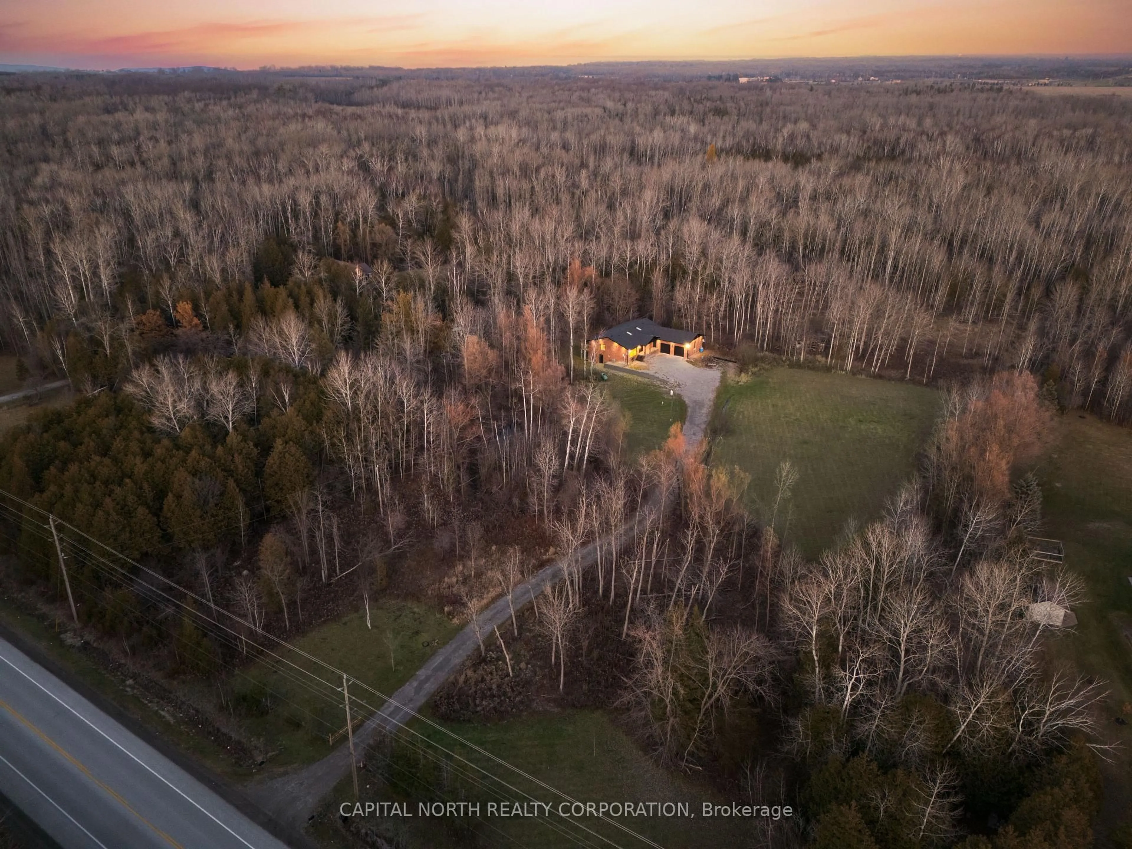 A pic from outside/outdoor area/front of a property/back of a property/a pic from drone, forest/trees view for 26375 Woodbine Ave, Georgina Ontario L4P 3E9