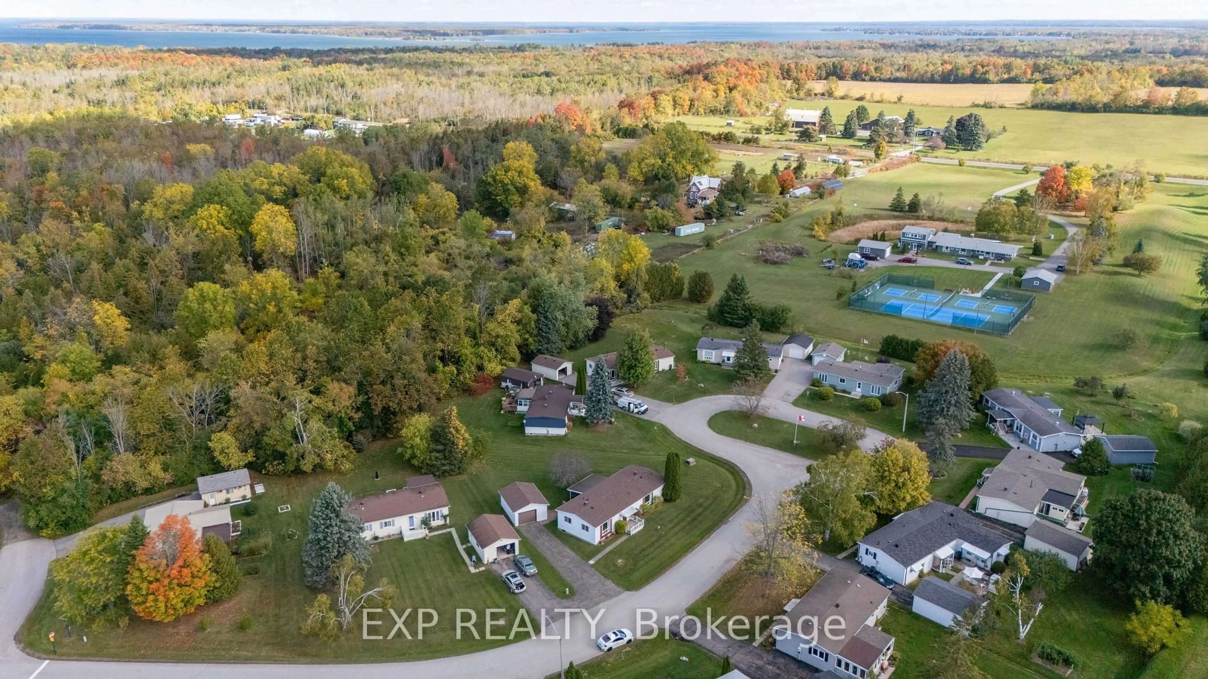 A pic from outside/outdoor area/front of a property/back of a property/a pic from drone, water/lake/river/ocean view for 11 Geneva Crt, Georgina Ontario L0E 1R0