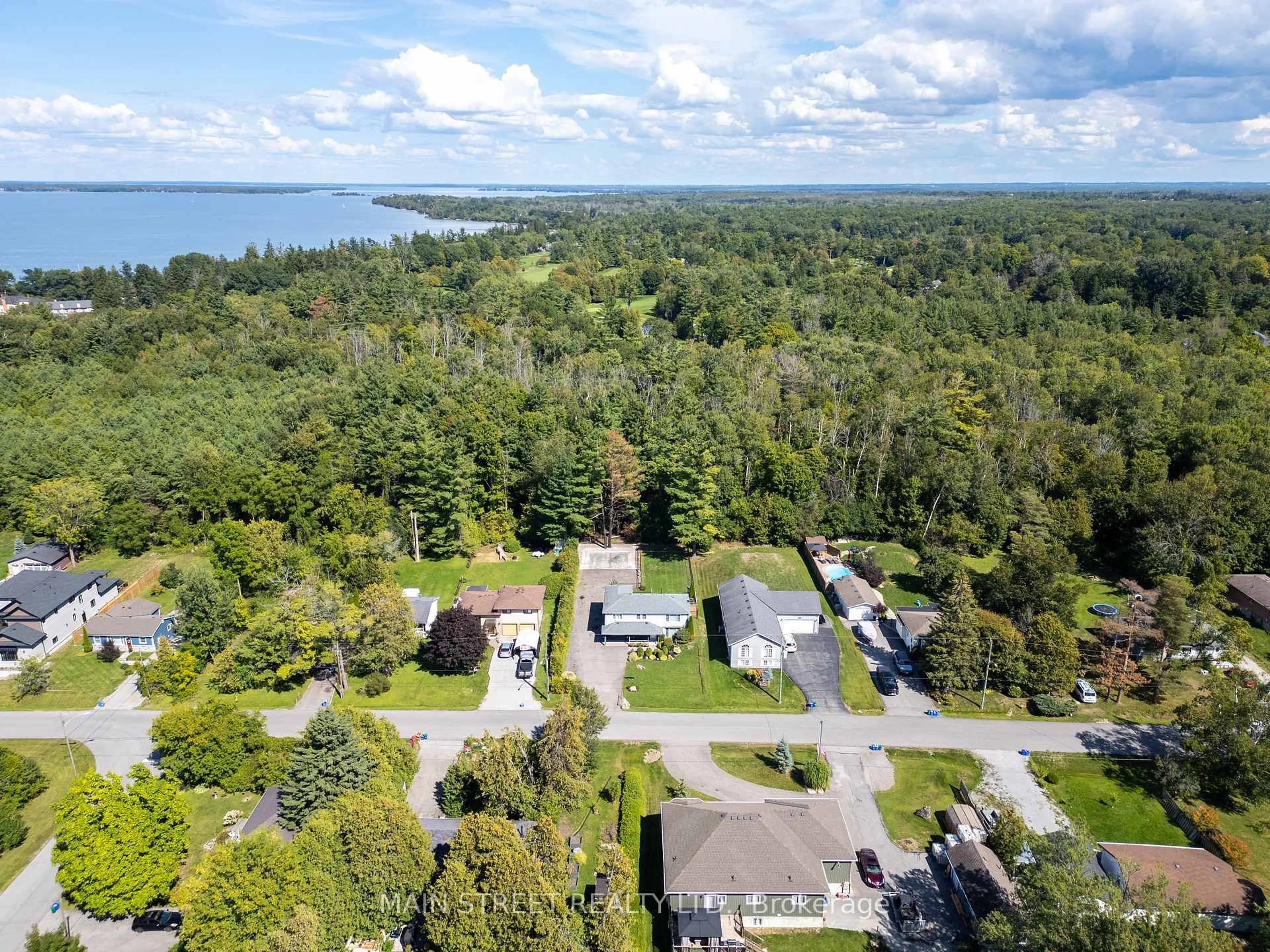 A pic from outside/outdoor area/front of a property/back of a property/a pic from drone, water/lake/river/ocean view for 23 Sunnidale Blvd, Georgina Ontario L0E 1L0