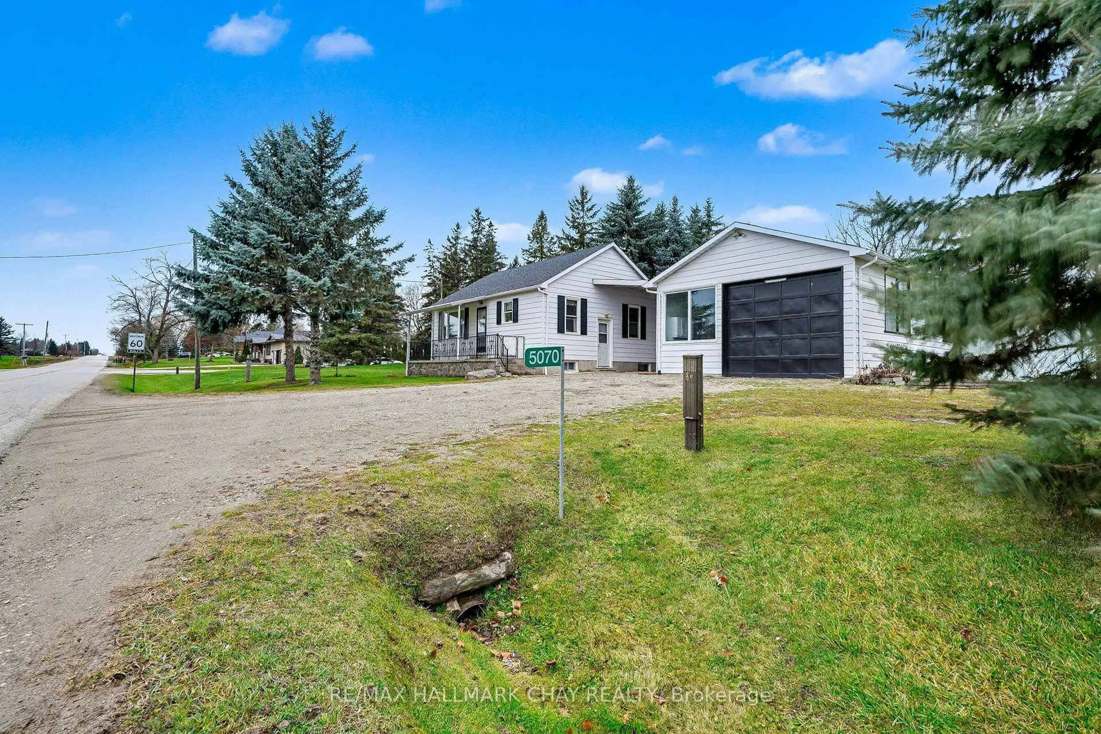 A pic from outside/outdoor area/front of a property/back of a property/a pic from drone, unknown for 5070 5th Line, New Tecumseth Ontario L0G 1W0