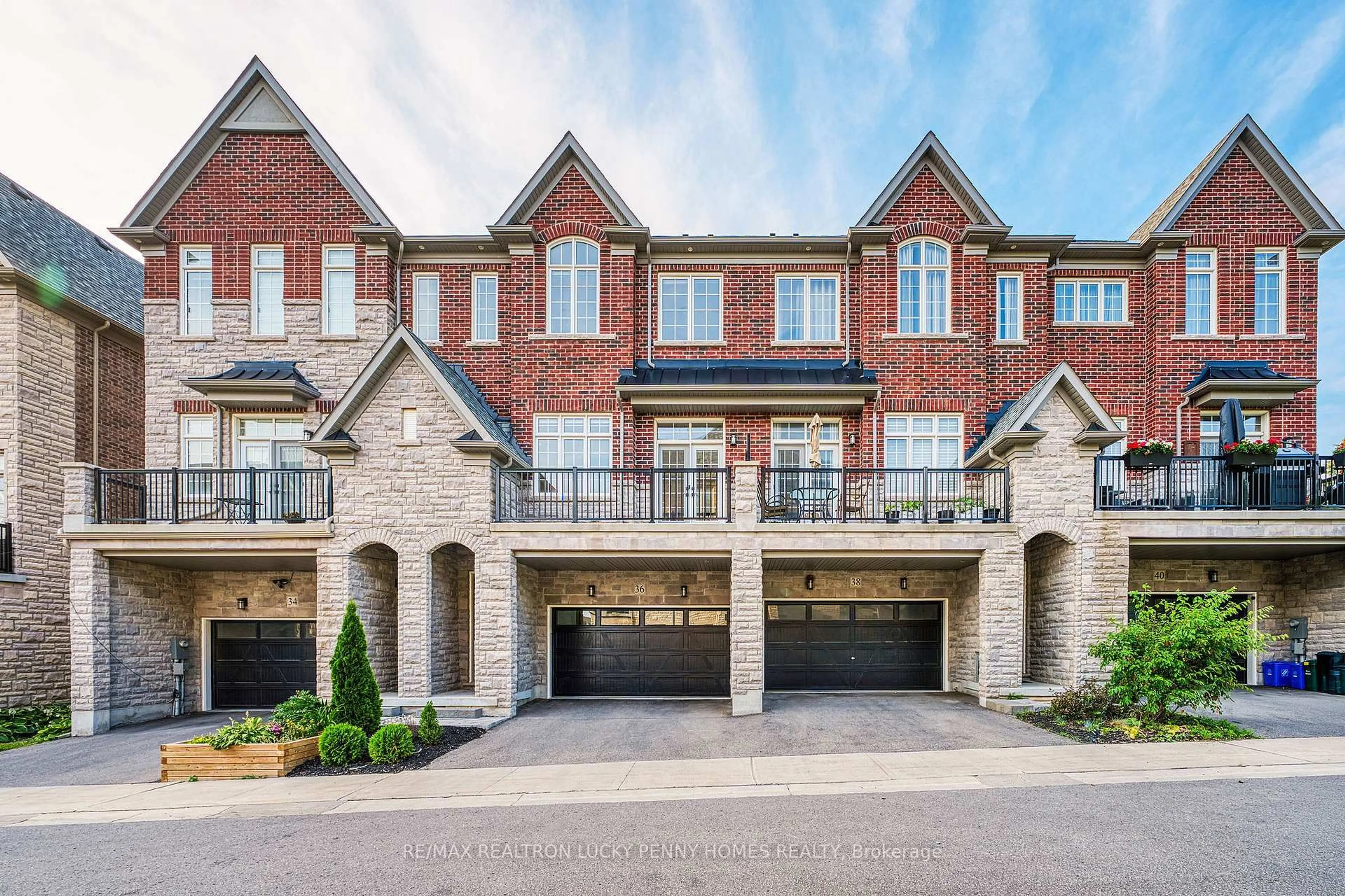 Home with brick exterior material, street for 36 Creekvalley Lane, Markham Ontario L6C 0Y7