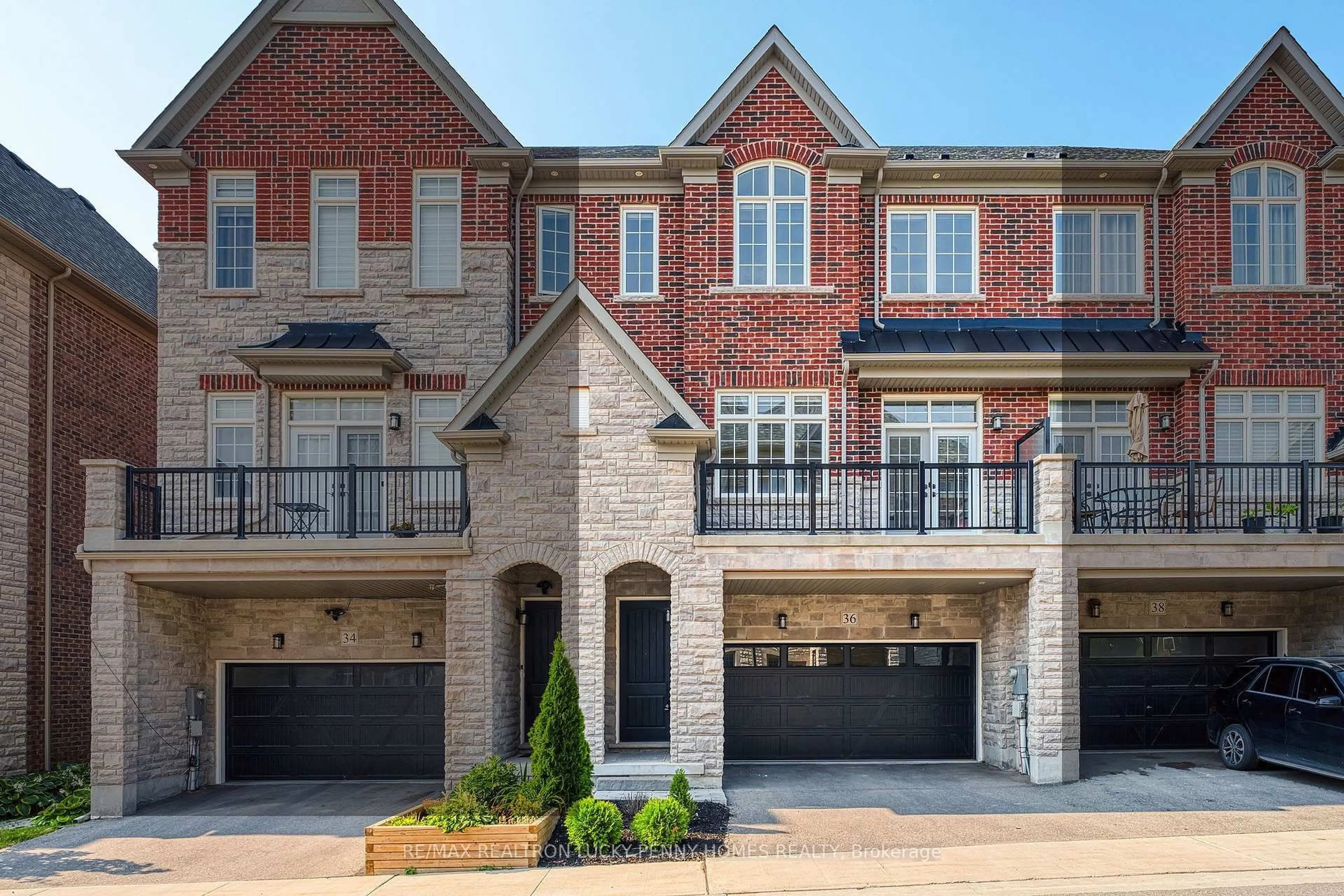 Home with brick exterior material, street for 36 Creekvalley Lane, Markham Ontario L6C 0Y7