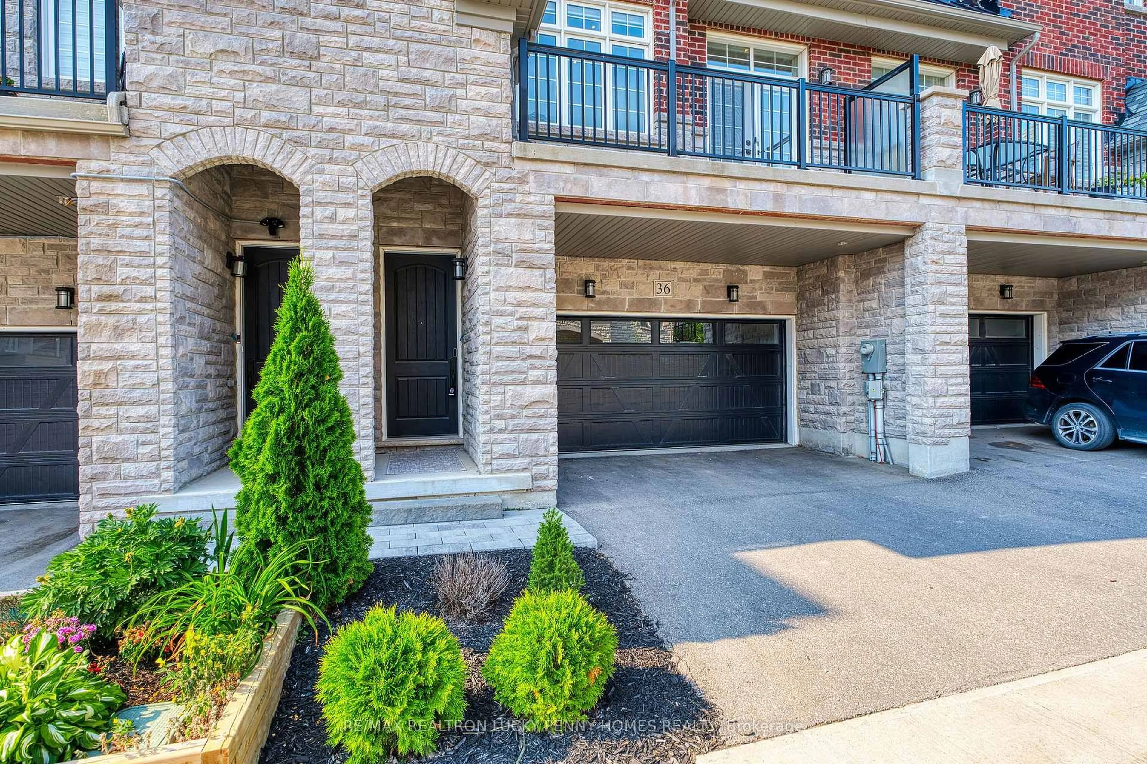 Home with brick exterior material, street for 36 Creekvalley Lane, Markham Ontario L6C 0Y7
