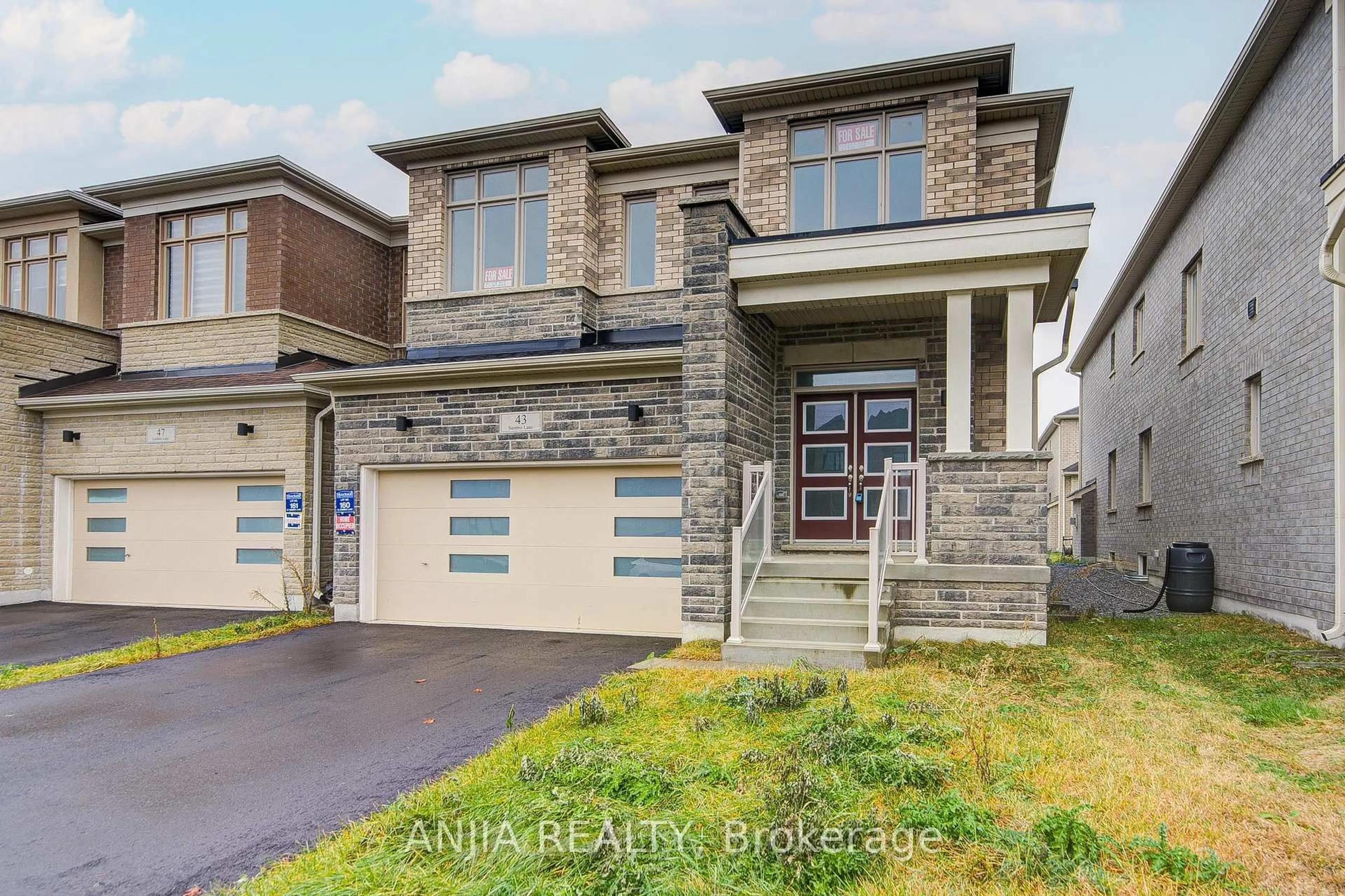 Home with brick exterior material, street for 43 Sambro Lane, Whitchurch-Stouffville Ontario L4A 0S1