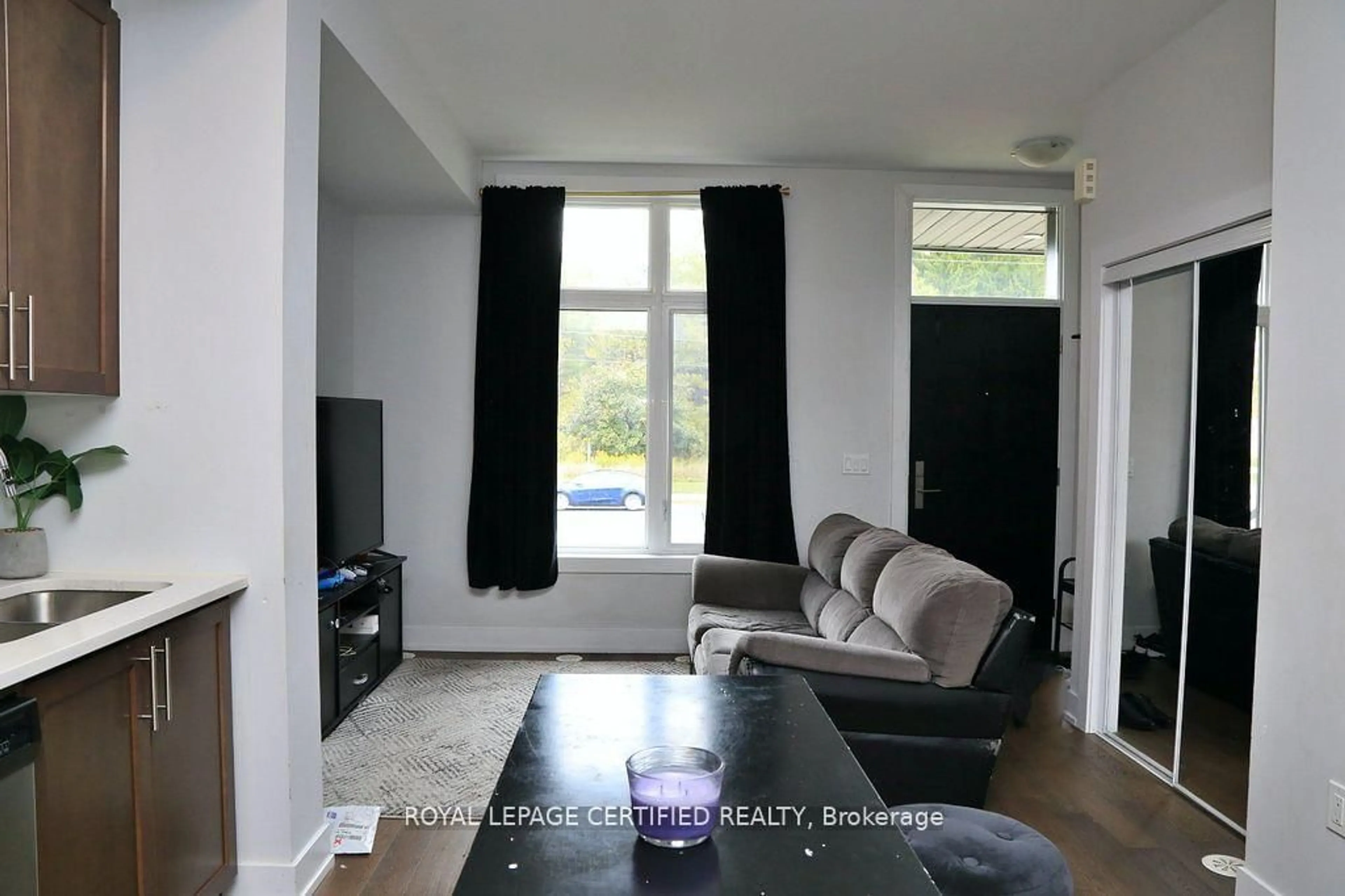 Living room with furniture, unknown for 9560 Islington Ave #L115, Vaughan Ontario L4H 5E8