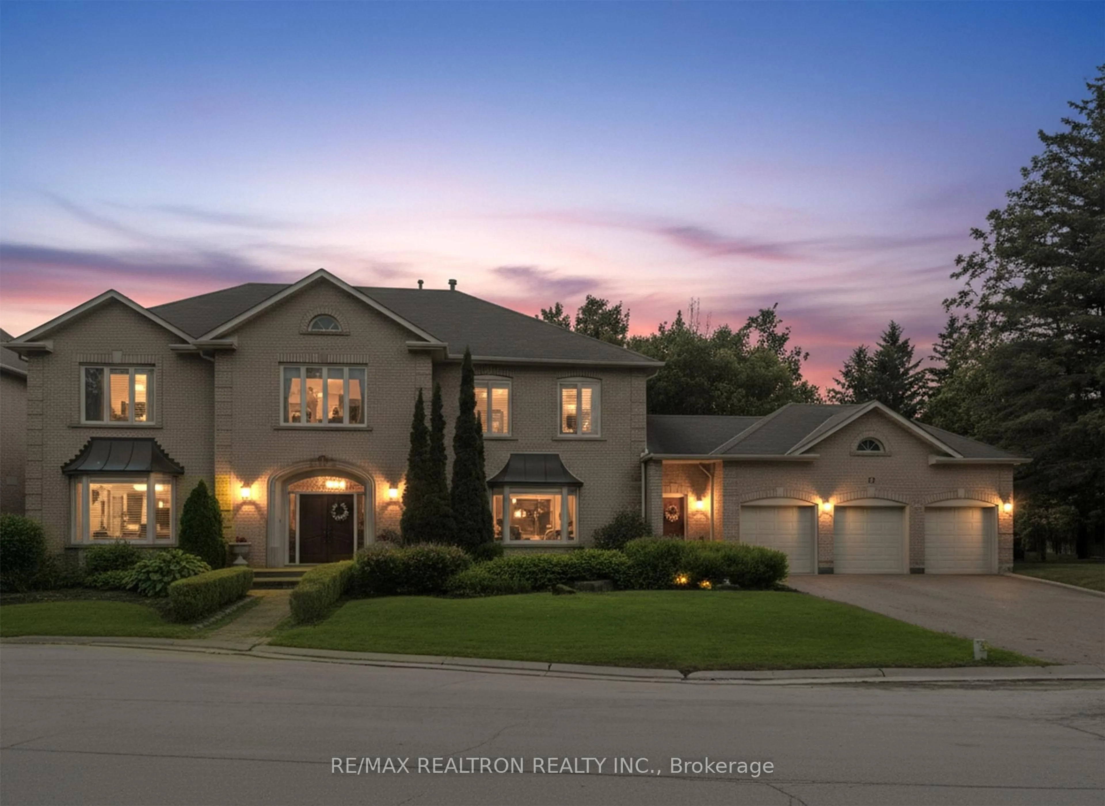 Home with brick exterior material, street for 12 Moodie Dr, Richmond Hill Ontario L4C 8C9