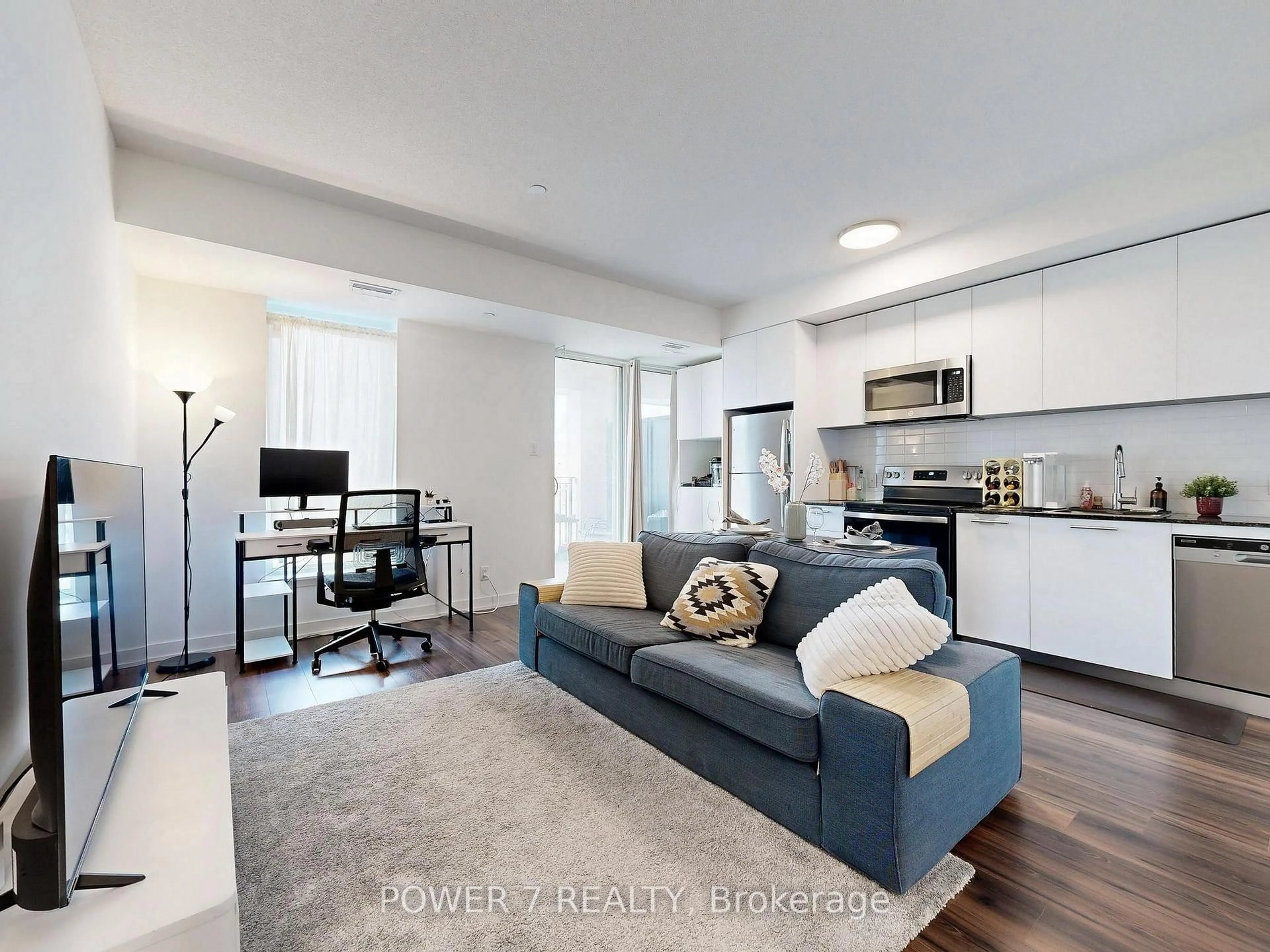 Living room with furniture, unknown for 101 Cathedral High St #337, Markham Ontario L6C 3L8