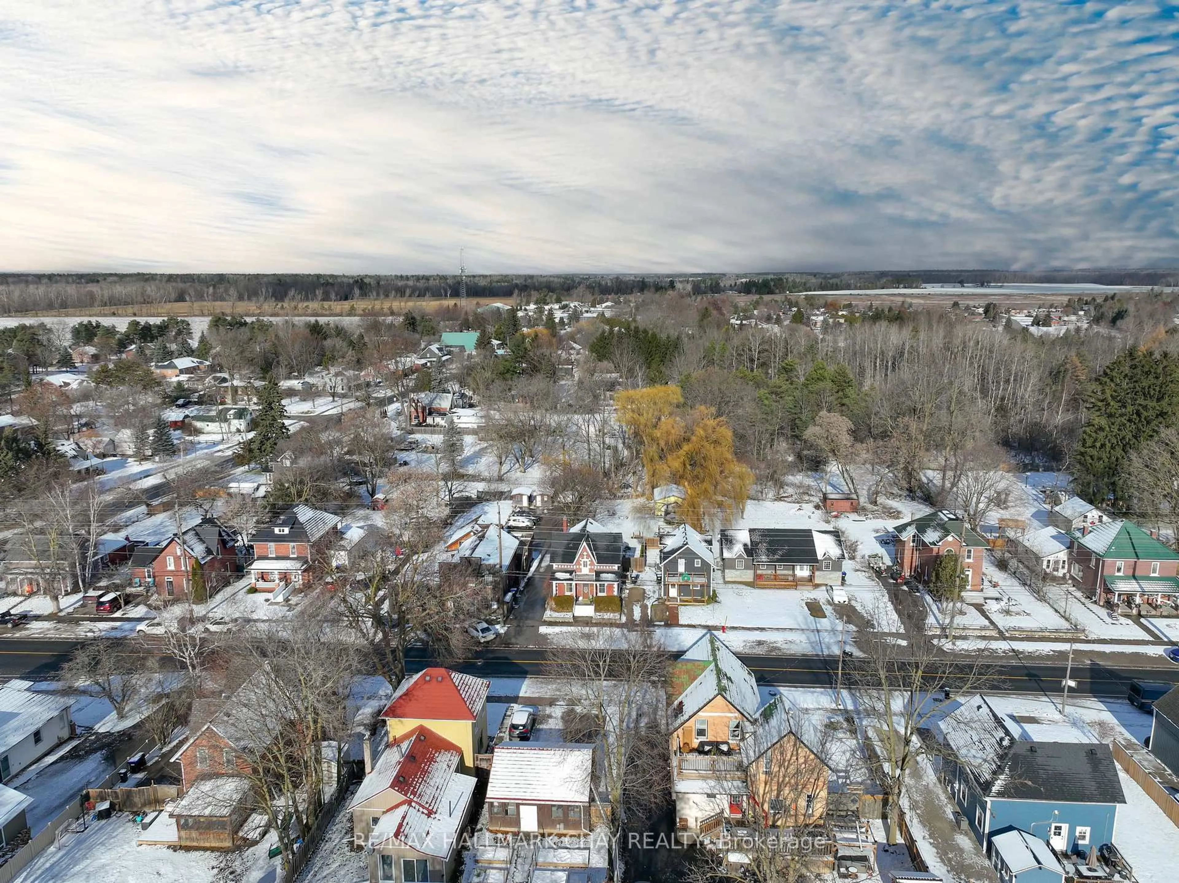 A pic from outside/outdoor area/front of a property/back of a property/a pic from drone, street for 8116 Main St, Adjala-Tosorontio Ontario L0L 1J0