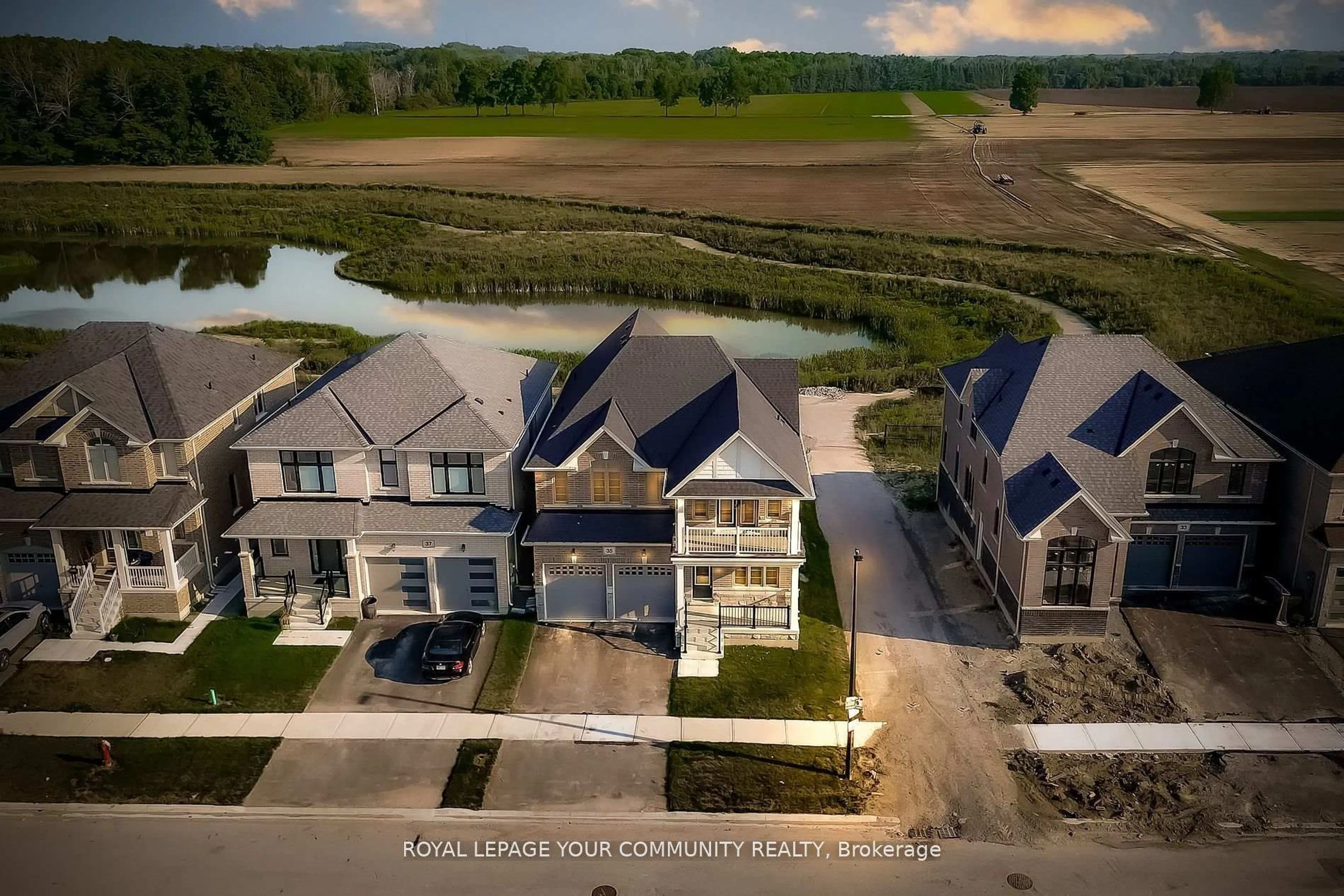 A pic from outside/outdoor area/front of a property/back of a property/a pic from drone, water/lake/river/ocean view for 35 Big Canoe Dr, Georgina Ontario L0E 1R0