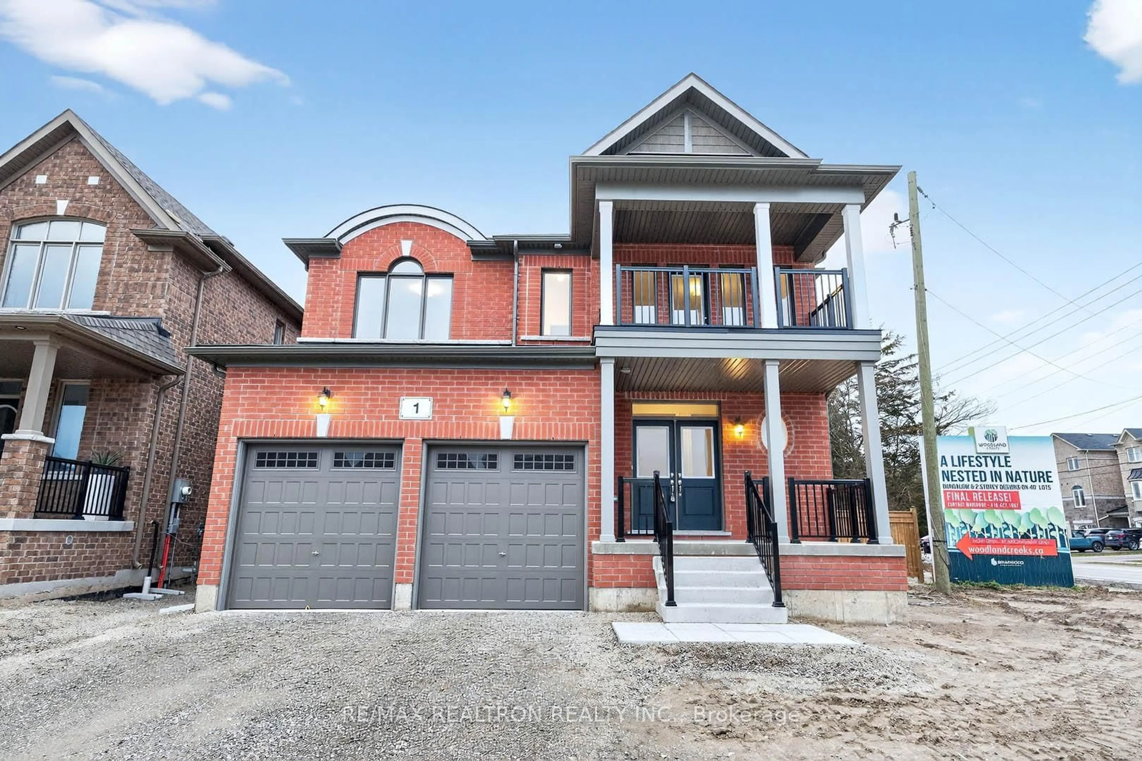 Home with brick exterior material, street for 1 Wakefield Blvd, Essa Ontario L3W 0L7