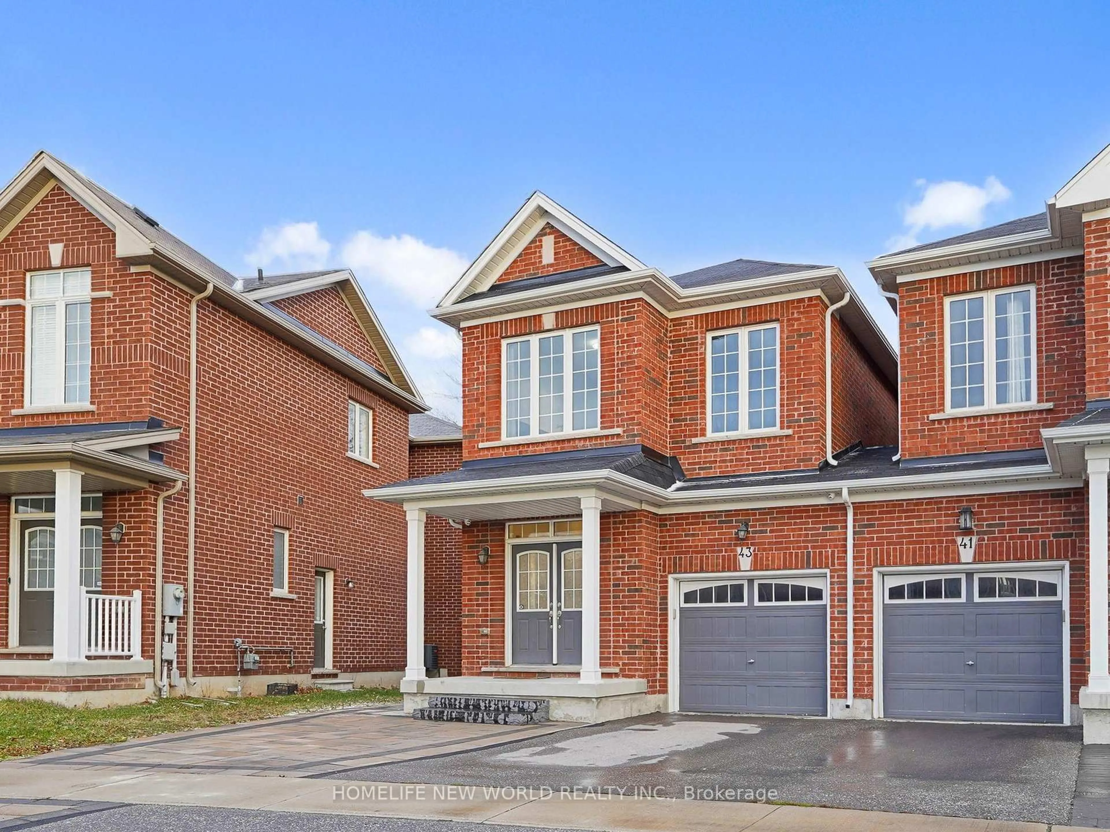 Home with brick exterior material, street for 43 Titan Tr, Markham Ontario L3S 0E2