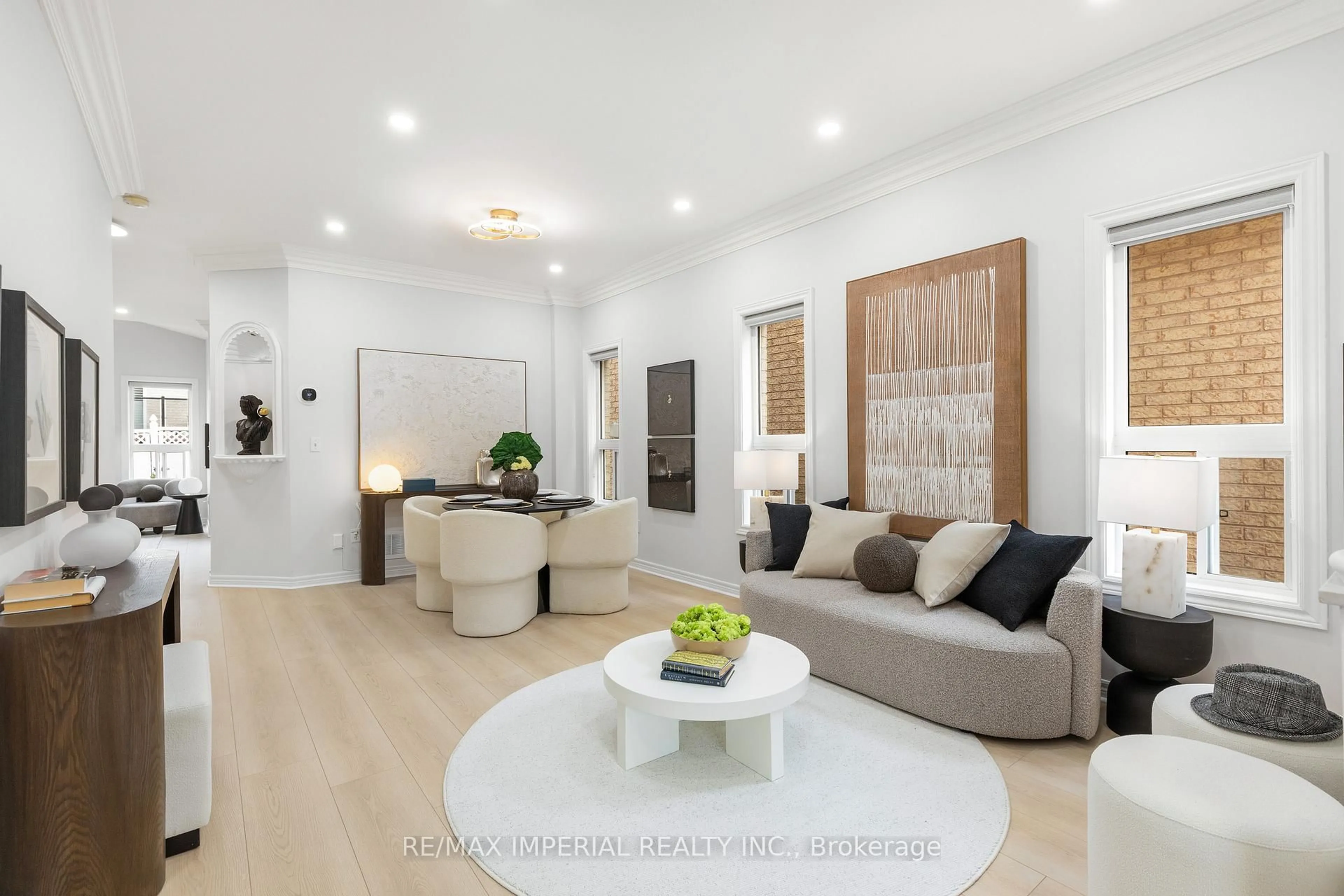 Living room with furniture, wood/laminate floor for 44 Hawkview Blvd, Vaughan Ontario L4H 2E2