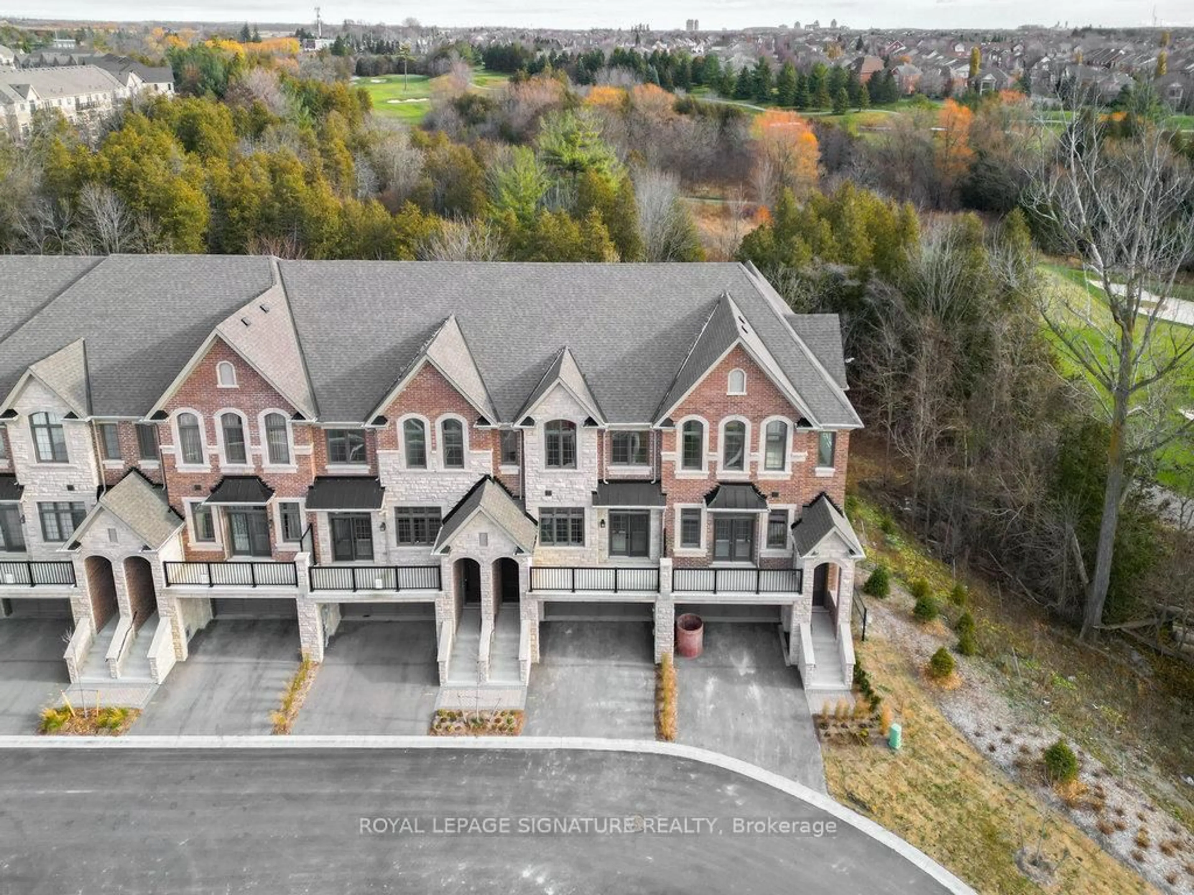 A pic from outside/outdoor area/front of a property/back of a property/a pic from drone, unknown for 95 West Village Lane, Markham Ontario L6C 3L5