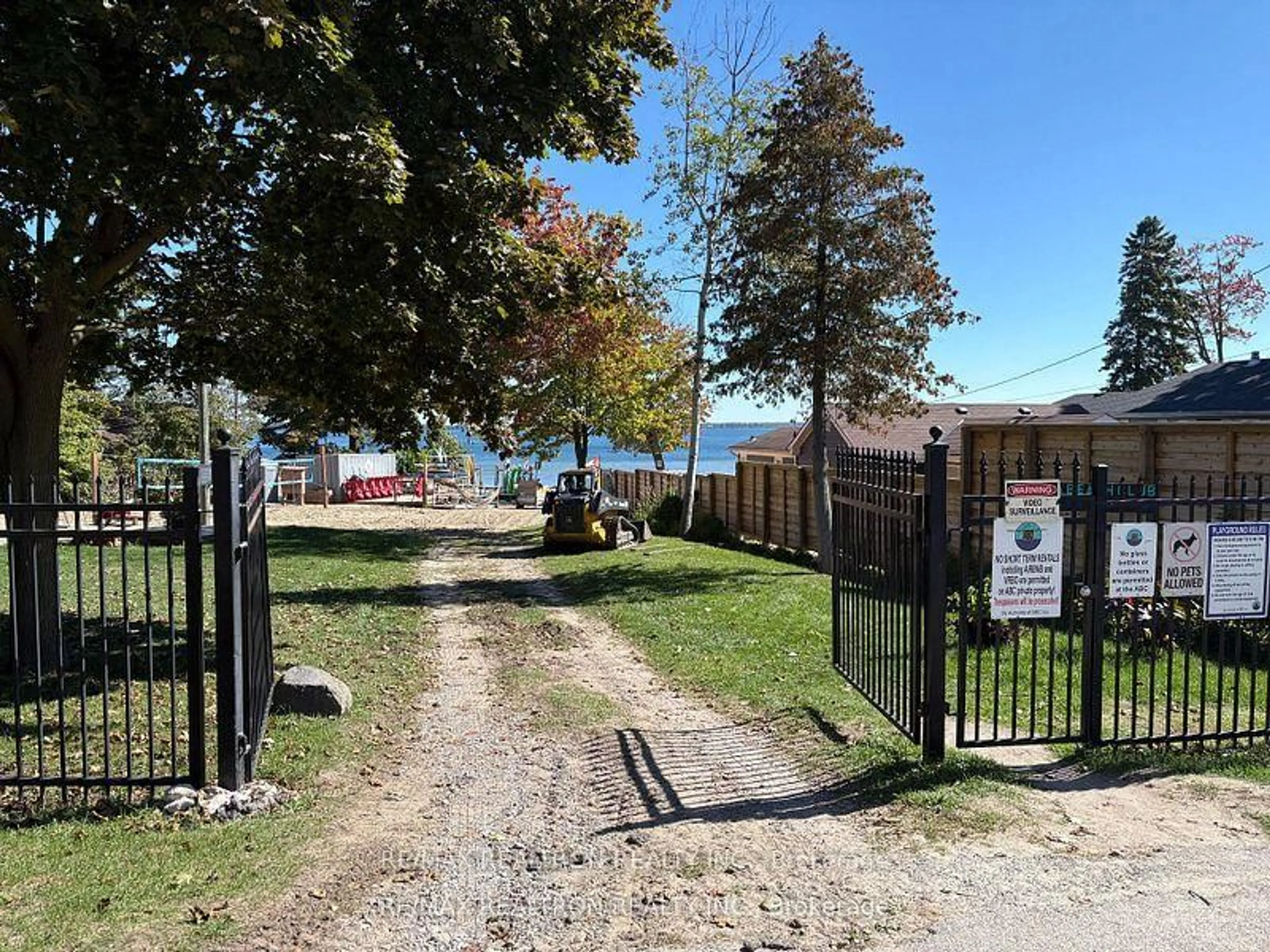 A pic from outside/outdoor area/front of a property/back of a property/a pic from drone, water/lake/river/ocean view for 911 Vicrol Dr, Innisfil Ontario L9S 1V4